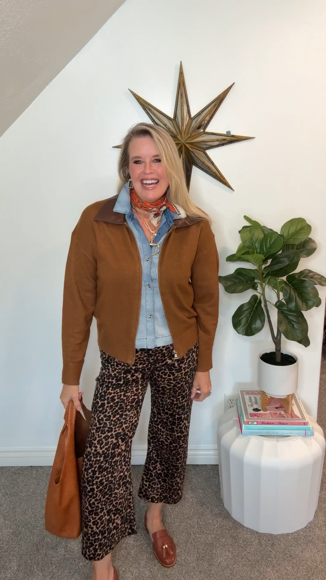 One of Falls🍂🍁Favorite shades… Cognac Brown

A color that works beautiful with shades of Brown, tan, spice, pumpkin, burgundy and denim.

Here’s 5 outfits I created using different ways to Style the color Cognac ….

I didn’t just use it in clotting, I used it in bags and shoes as well, to show how versatile this color can be.

Outfit 1. A cognac zip sweater with Faux chocolate brow leather, pairs perfectly with leopard collet wide leg pants and a denim shirt for contrast. 
A shades of Fall horse bit scarf  adds interest and another small pattern! The Vegan tote has been a long time favorite for years. Cognac platform loafers 

#2. Pairing chocolate brown denim jeans (this seasons hot color)  chocolate brown stud ballet flats & chocolate brown belt, having these 3 items all the same color adds a sliming and elongated look, while adding Interest to the outfit with a denim shirt and a cute crochet cognac detail cardigan 

3. A darker version of Cognac brown in these free people inspired cords, elastic band , oversized pockets and tulip bottom , pairs great with the free people Inspo striped lightweight sweatshirt, with red trip detail.
As you can see, I love to break up the color with a touch of denim.I feel it always adds texture and contract. Even though it’s Fall, Rattan in this weave on the Mary Jane’s and bag, still work because of the leather trim, giving it that  (fall basket look) the added texture really makes the outfit come together. 

#4 
Here we have a classic old money look, cognac button up cardigan worn as the top, paired with a pleated high waisted wide leg trouser. In tan. (I sized up on the trouser)  and pulling this look together I chose a fab cognac tassel leather loafer by Cecelia New York. Tts and a tan leather envelope bag by Paris 1964 
(I realized I need a Tan leather belt) Something I am going to be on the look out for:)

#5. This look is about the cognac shoes and bag, pairing them with shades of Olive green and burgundy … a fun color combo, specially for this time of year. 
Platform loafers tts, Paris 1964 leather bag 
Cuff denim jeans. 


#LTKFindsUnder100 #LTKStyleTip #LTKOver40