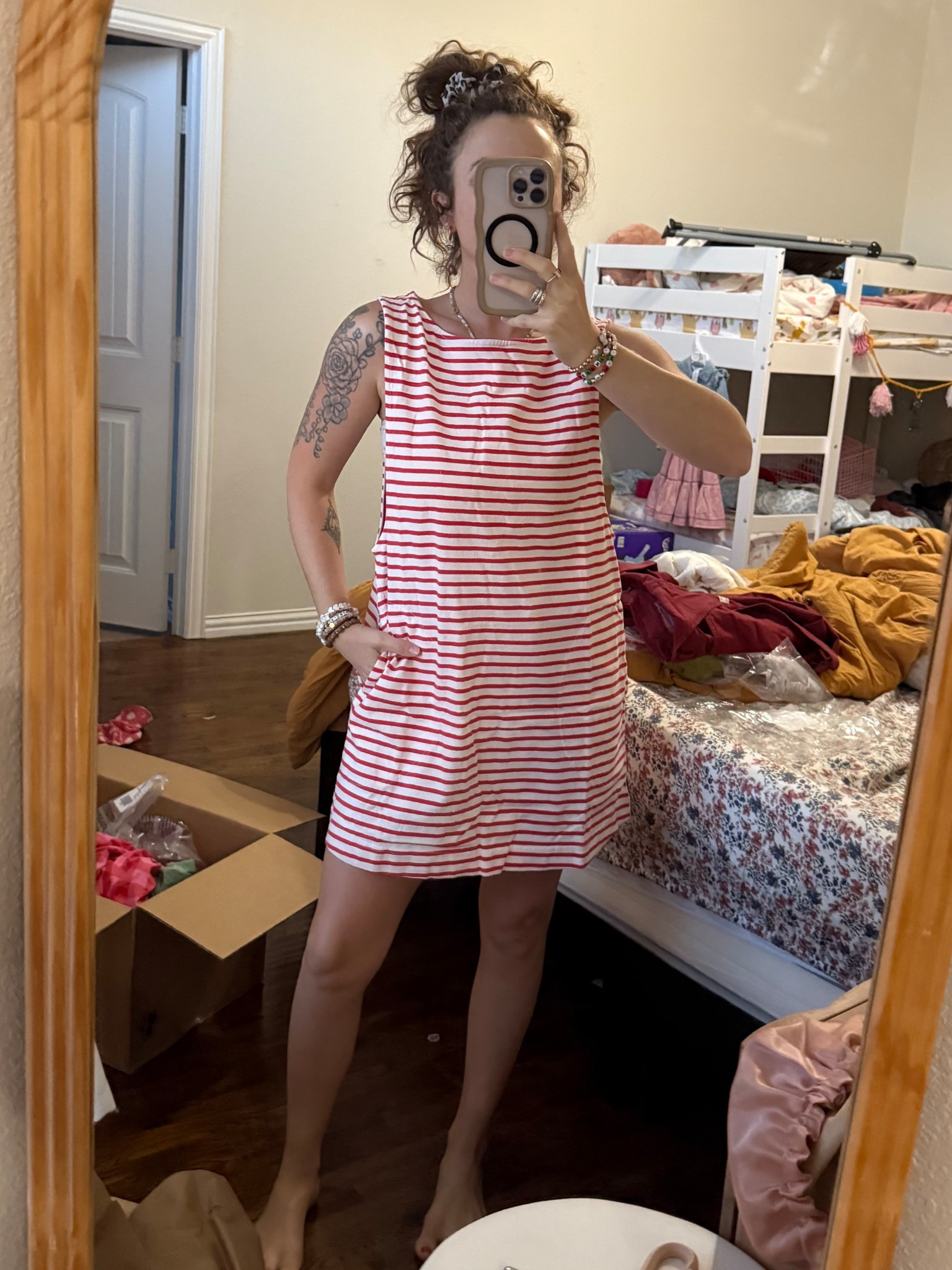 Wearing small. Breastfeeding friendly arm holes 