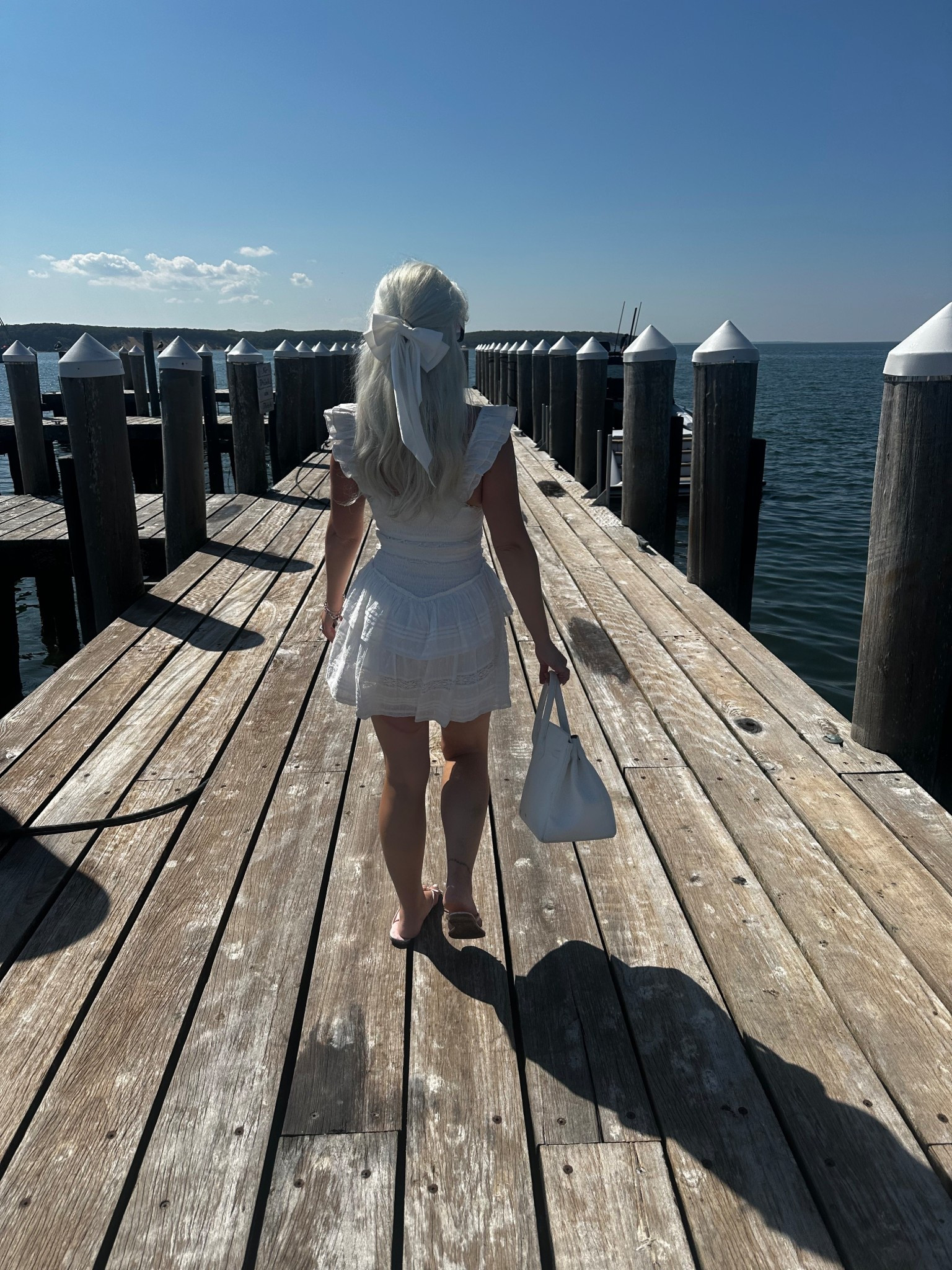 Forever in my bow era 🍸🎀🤍 my cutie dress is on friends and family at bloomies! 

#LTKStyleTip #LTKSaleAlert #LTKFallSale