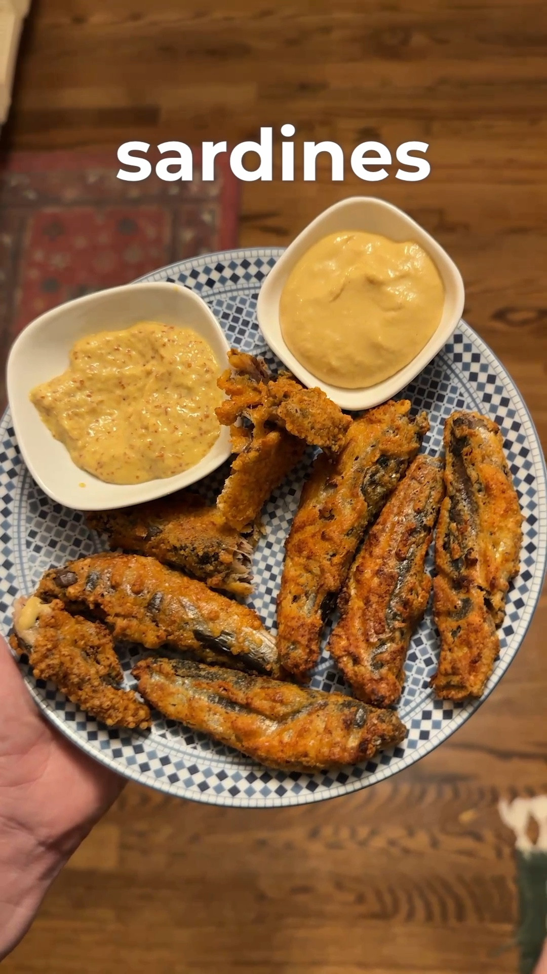 You can use code Jenny30 on Amazon to save money on the Tastee, fyi😀

Today’s recipe is Carnivore air fried canned sardines:

2 cans wild planet sardines
1 large egg
1/2 cup finely grated pecorino Romano or Parmesan Reggiano cheese
1/2 tsp garlic powder
1/2 tsp smoked paprika
1/2 tsp white pepper

1. Crack an egg on a small side dish and mix the yolk in the white together.
2. Place the grated cheese and spices onto another side plate and thoroughly mix
3. Open two cans of sardines and remove the sardines from the can, being delicate, so that the fish don’t break apart
4. Dip each fish in the egg mix and then roll it in the cheese and spice mixture until thoroughly covered and set on a dry plate
5. Once all the fish are covered in the egg cheese mixture, placed the fish into your air fryer and set air fry mode at 400°F for 10 minutes
6. Flip the sardines at least one time so that all sides become crispy
7. Removed from the air fryer and place into a bowl or on a plate and allowed to cool for a few minutes.
8. These crispy sardines can be served with a side of Dijon mustard or spicy horseradish Dijon mustard or whatever dipping sauce you prefer.

#carnivore #carnivorerecipes 