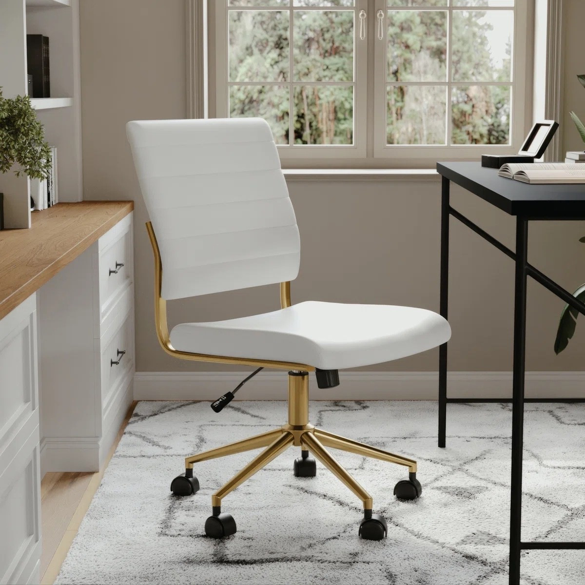 Chic and functional home office upgrade with this Martha Stewart ribbed upholstered armless swivel chair from Wayfair. The white faux leather seat paired with the gold metal base gives it that modern glam touch while still feeling clean and minimal. The swivel design and rolling casters make it perfect for a small office, vanity setup, or stylish desk space. Such a pretty way to elevate your work from home routine. 

#LTKsalealert #LTKhome