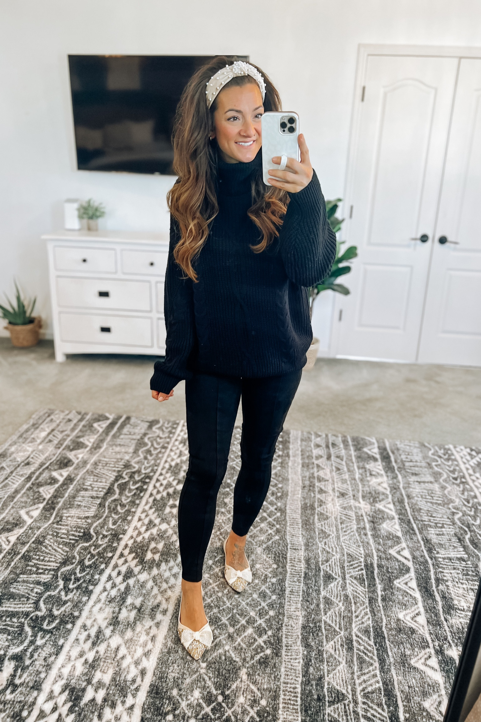 Thanksgiving Day outfit idea! Leggings are my go to option and this cable knit sweater is the perfect pairing! I sized up one to the medium. The holiday flats are also super comfy and very cute with the details! I sized up half a size in these. 

#LTKHoliday #LTKfindsunder50 #LTKstyletip