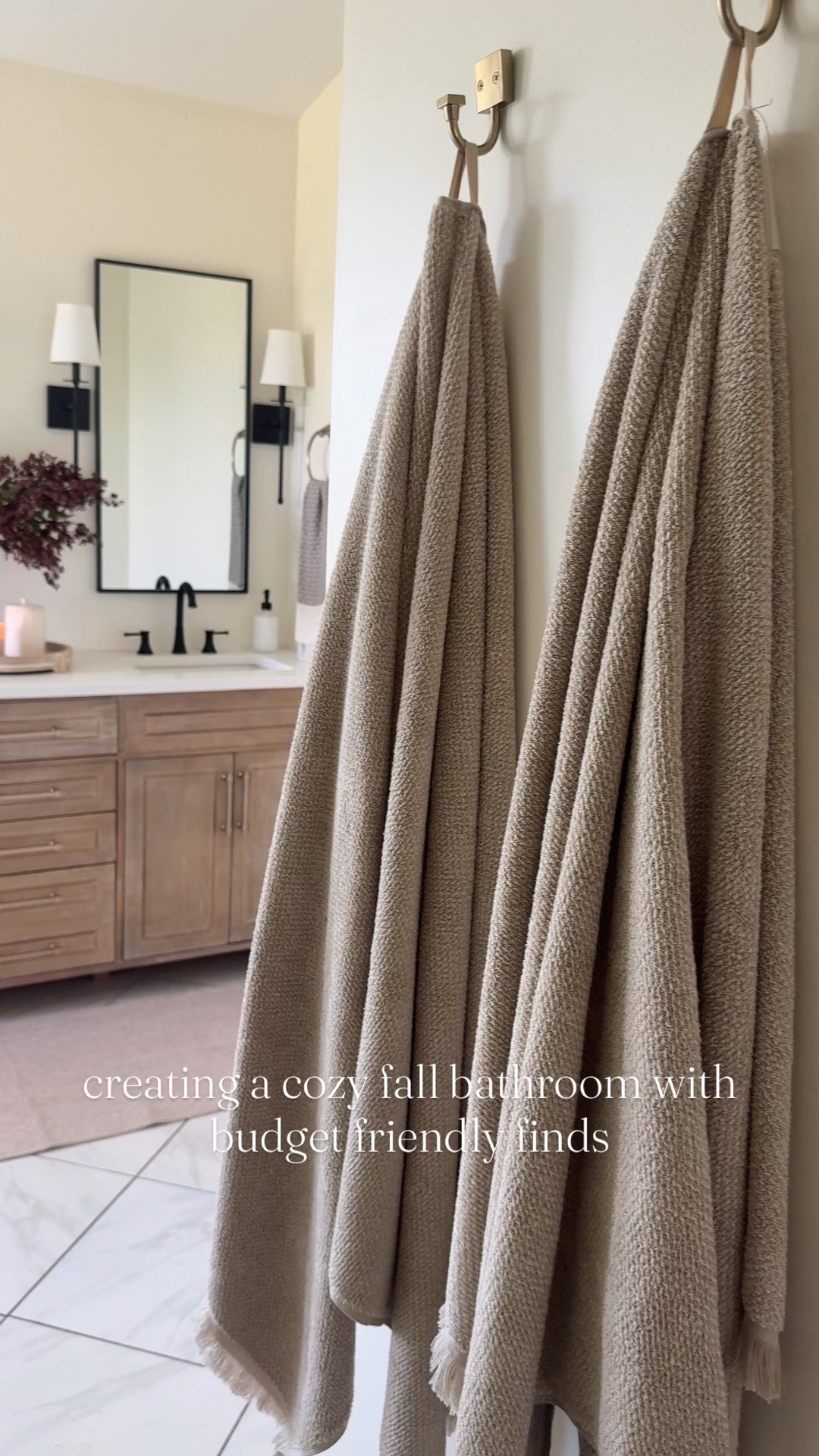 Cozy fall bathroom inspo, bathroom vanity, bathroom cabinet, bathroom decor, fall decor, bath towels, hand towels, fall florals, wall mirror, wall sconces, bath mat, runner rug, champagne bronze

#LTKHome #LTKSaleAlert #LTKSeasonal