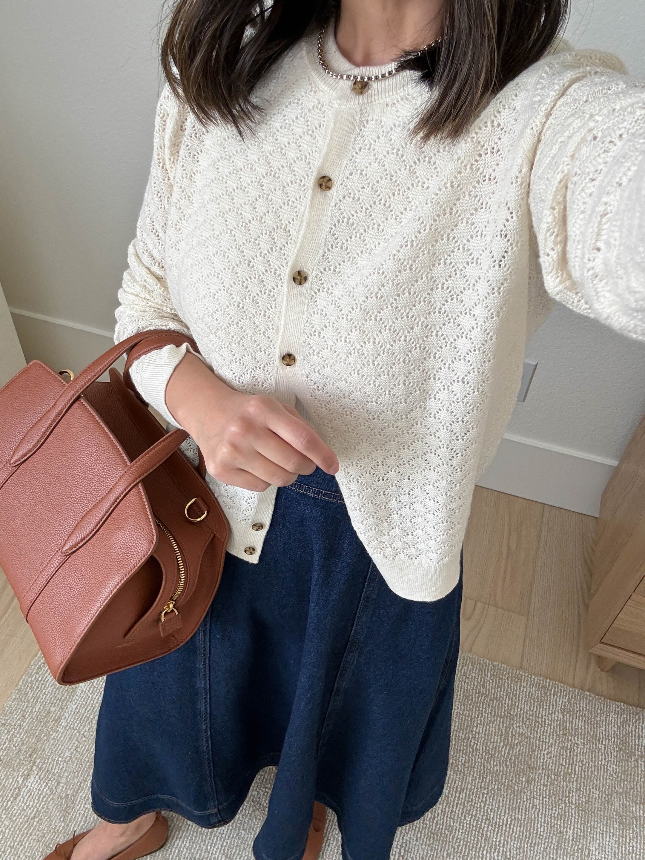 Fall outfit ideas. The perfect denim midi skirt. Truly, so so good. The color is fantastic, dark. Heavy weight, pockets, simple zipper in the back. Sze up, it runs small

Gap cardigan small
Reformation skirt 25
Everlane flats 5
Parisa Wang bag 
Celine sunglasses

#LTKSeasonal #LTKHoliday #LTKFindsUnder100