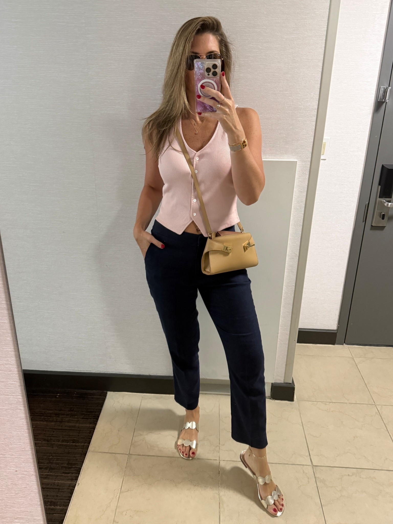 This vest / tank has been on high rotation! I have it in every color and love being able to dress it up or down. Paired it with a cotton/linen blend pant. This style is old, but linked some great options that are similar. Finished with a gold flat sandal for a polished yet casual look. Perfect for lots of walking around the city!

Tank runs TTS. Wearing a S.

Sandals run TTS. (If in between sizes size down). Now on sale for under $100!

#LTKOver40 #LTKTravel #LTKShoeCrush