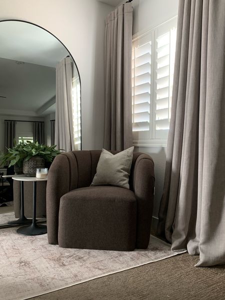 New accent chair in bedroom 

Accent chair
Curtains 
Oversized mirror 
Arched mirror 
Accent table 

#LTKfindsunder100 #LTKfindsunder50 #LTKhome