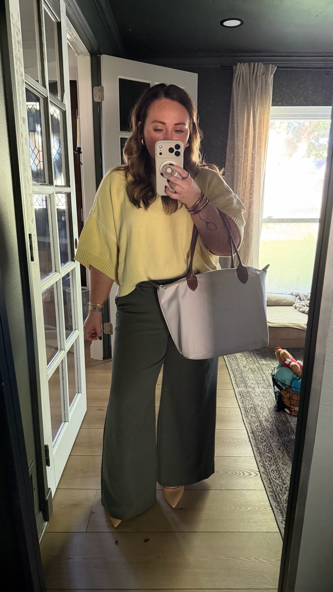 Easy work outfit when you want to look put together without wearing another blazer 💛 pants and heels are TTS, the sweater is oversized but cropped so I stuck with my normal size so it would be long enough to tuck in.

#LTKootd #LTKMidsize #LTKWorkwear