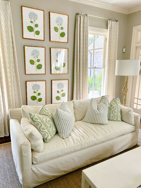 Grand millennial white slip cover ivory sofa - with pillows 

#LTKunder100 #LTKfamily #LTKsalealert