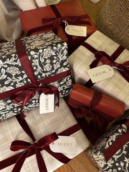 My Christmas gift wrapping this year! Green wrapping paper, neutral gift wrap, burgundy wrapping paper, satin ribbon, velvet bow.

#LTKHoliday #LTKSeasonal #LTKhome