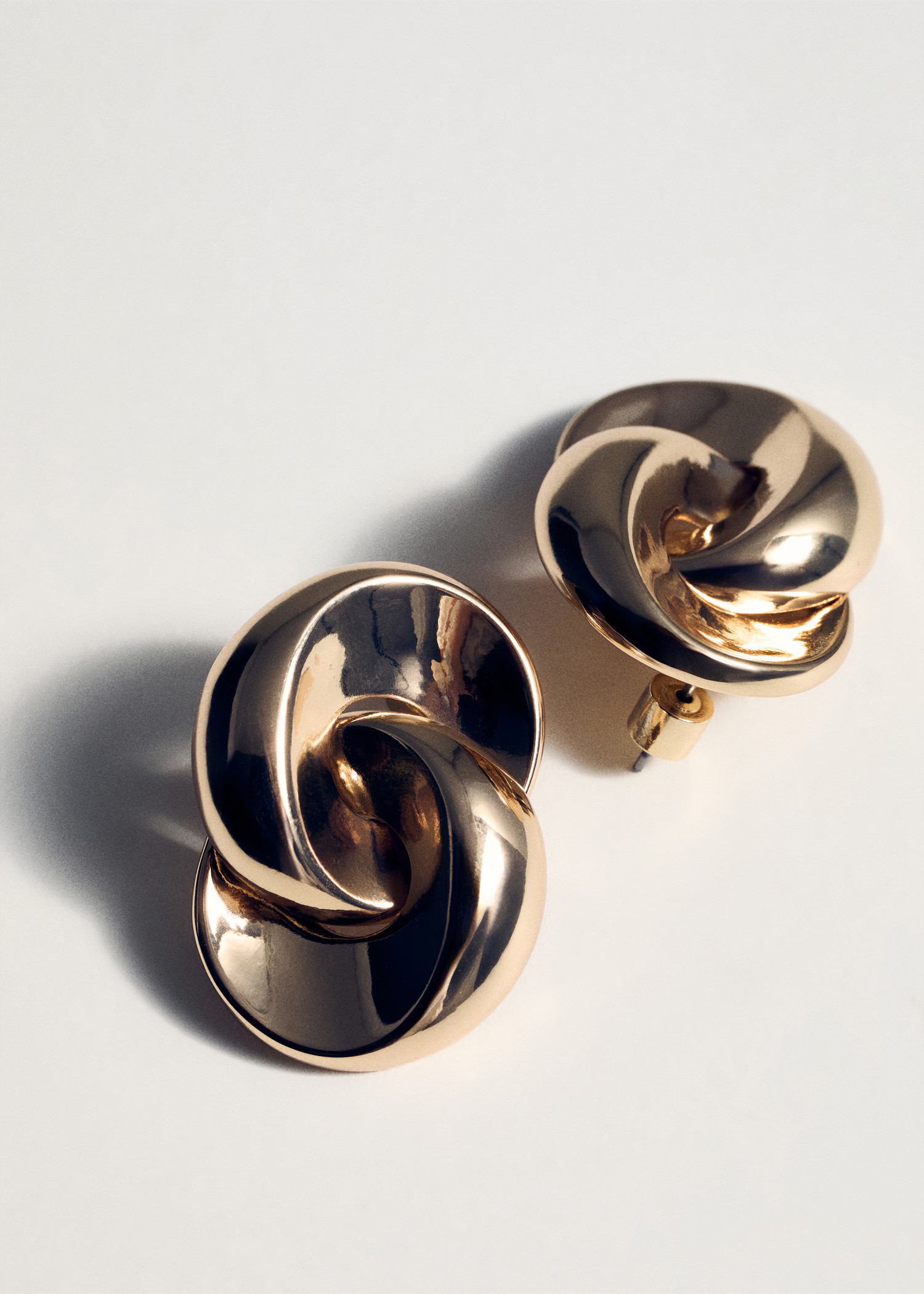 Intertwined hoop earrings | MANGO (UK)