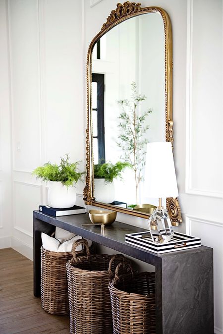 Entry decor, entry console table, wall mirror, gleaming Primrose mirror, Anthropologie mirror, brass mirror, gold mirror, crystal lamp, Amazon home, Amazon Finds, Tjmaxx, coffee table book, Tom Ford book, candle, brass Decor, black-and-white Decor, tarGet Home, target Finds, tall basket, studio McGee, olive tree, planter,

#LTKhome #LTKSeasonal #LTKstyletip