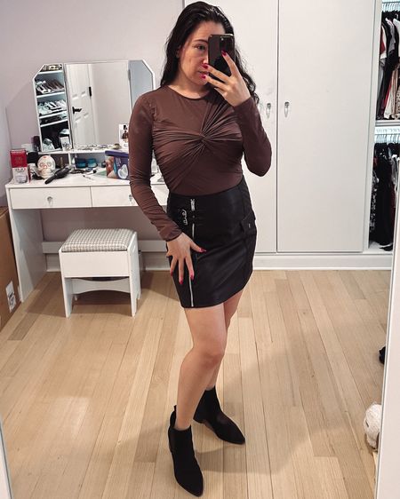 New top and faux leather skirt for a cute going out look. Date night, girls night, club or party..I’m wearing this to my sister’s birthday dinner next month. Sized up to a medium in the top. 

#LTKparties #LTKfindsunder100 #LTKstyletip