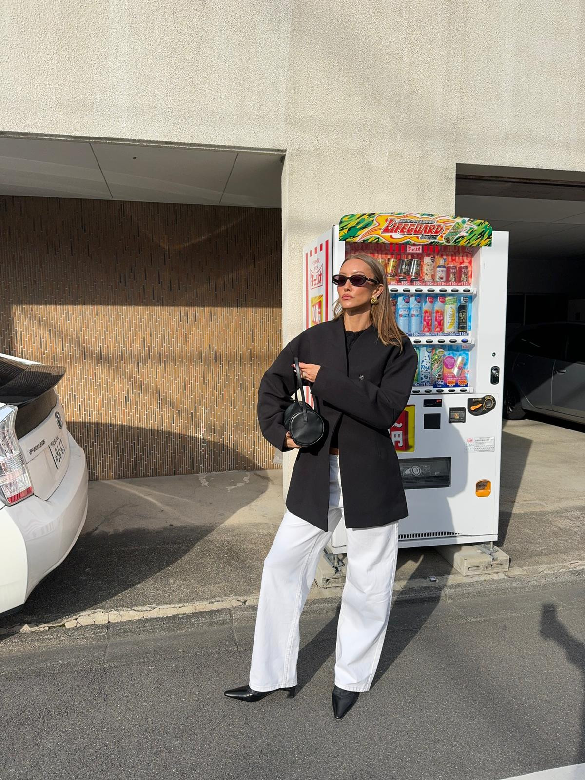 Japan street style in my KHY jacket! Paired with white wide-leg pants, pointed boots, and a black bag 🤍 Tagged exact and similar items! 

 #LTKaustralia #LTKtravel #LTKstyletip