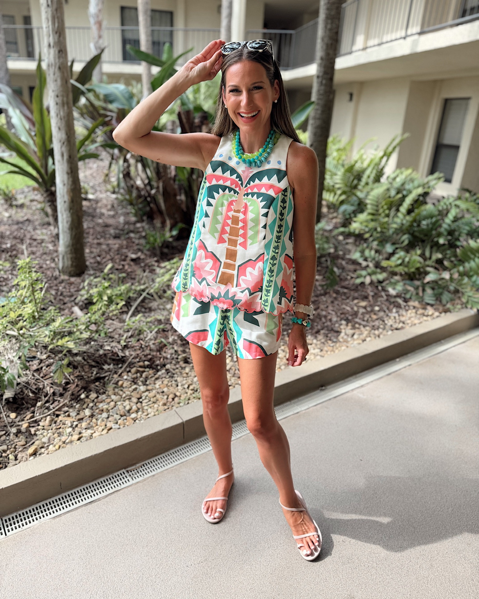 Beach vacation ootd! In a small shorts and top, sandals, sunglasses, necklaces and accessories- fits tts.

#LTKTravel #LTKSeasonal #LTKootd