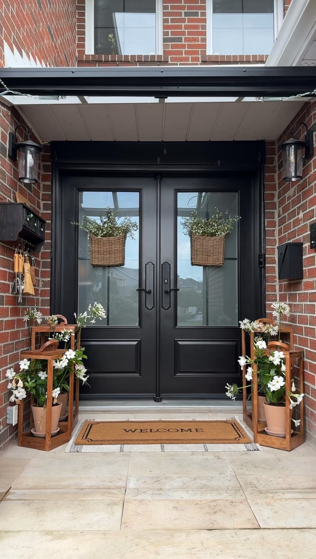 We could have unalived our guests! I didn’t know how bad the state of our doors were until we took them out. Half the structure was missing due to rotting wood and carpenter ants. 

Since we had to replace them, I figured this was my sign to give our porch a makeover. 

I’m not sure which part is my favourite, the wall basket as a wreath alternative or our lanterns holding plants instead of candles!

#LTKVideo #LTKHome