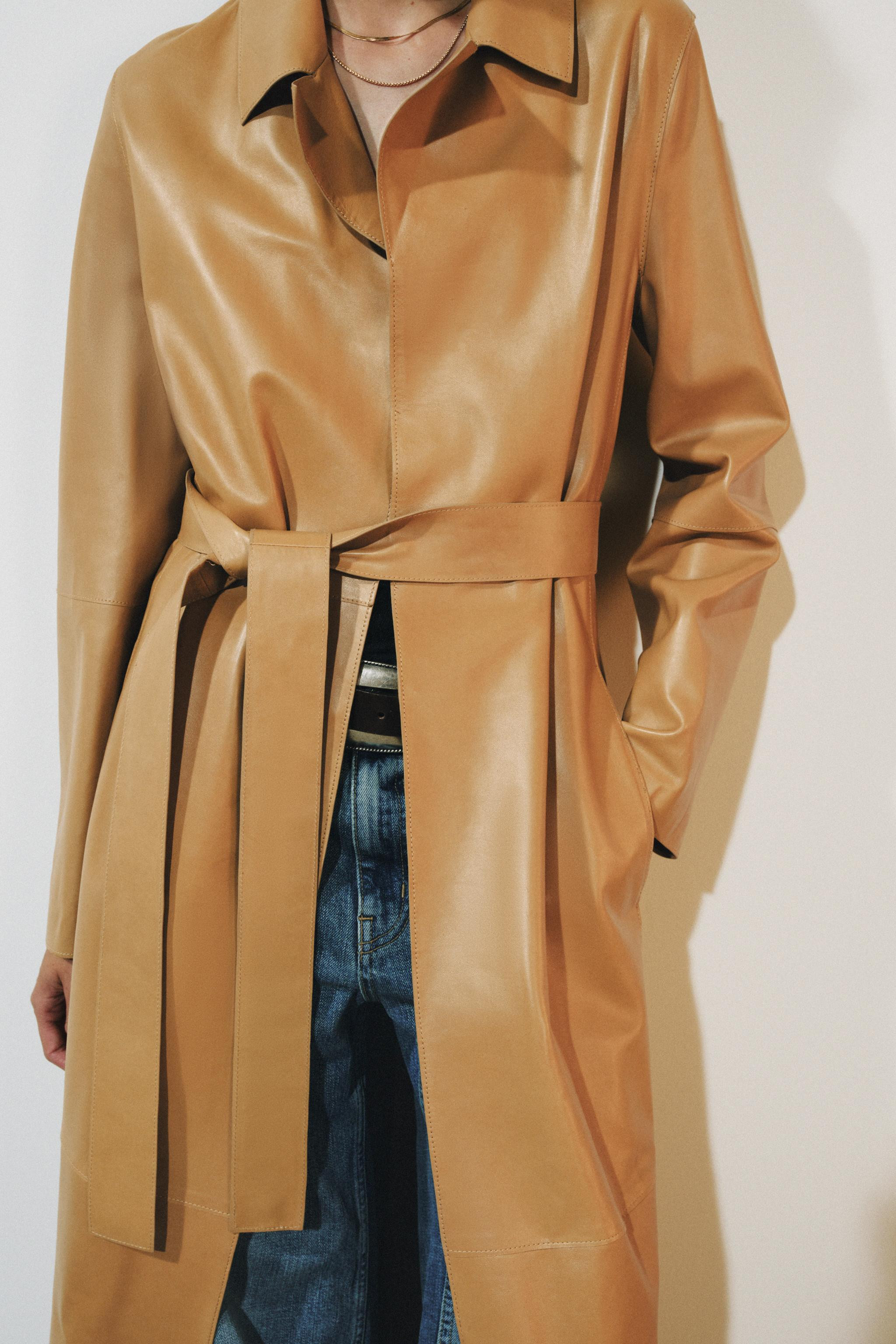 ZARA WOMAN COLLECTIONCoat made from 100% leather. Lapel collar and long sleeves. Side pockets con... | Zara US