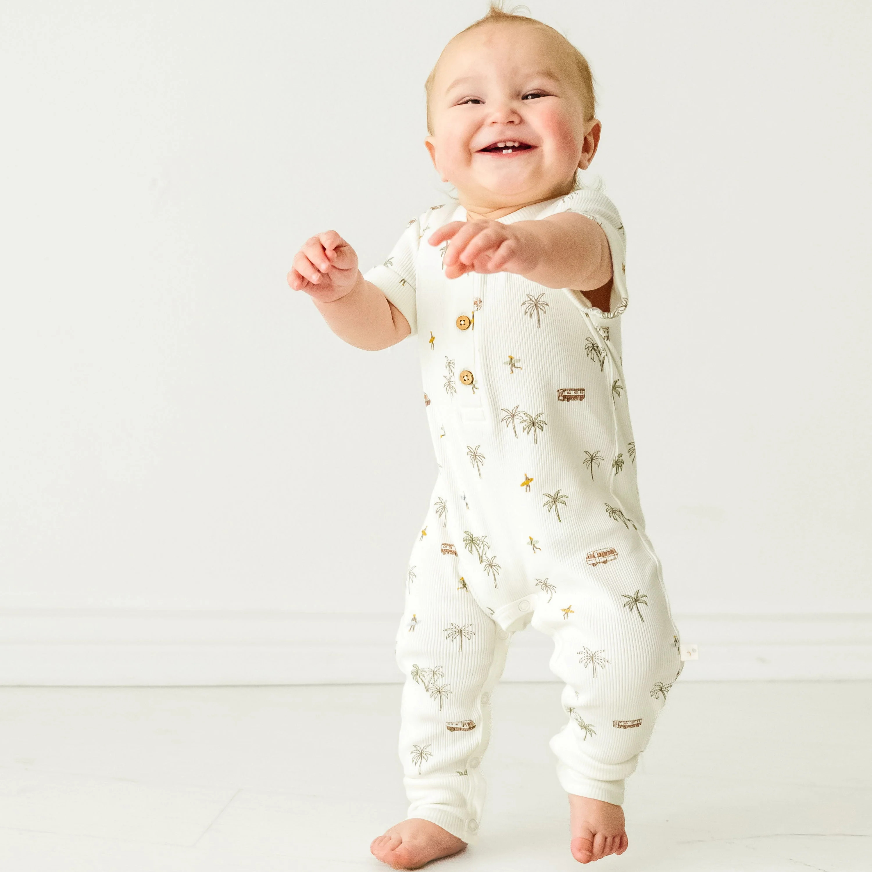 Organic Short Sleeve Button Romper - Malibu | Makemake Organics | Makemake Organics