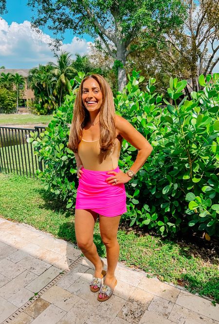 Oh hey spring break! I see you! Loving this one piece shimmer suit from @jcrew coupled with a hot pink cover up skirt bottom I snagged on Amazon. Dresses it up with some @toryburch slides perfect for the hotel pool I plan to sip margs by! 😎 ✌🏼 

#LTKFestival #LTKSeasonal #LTKswim