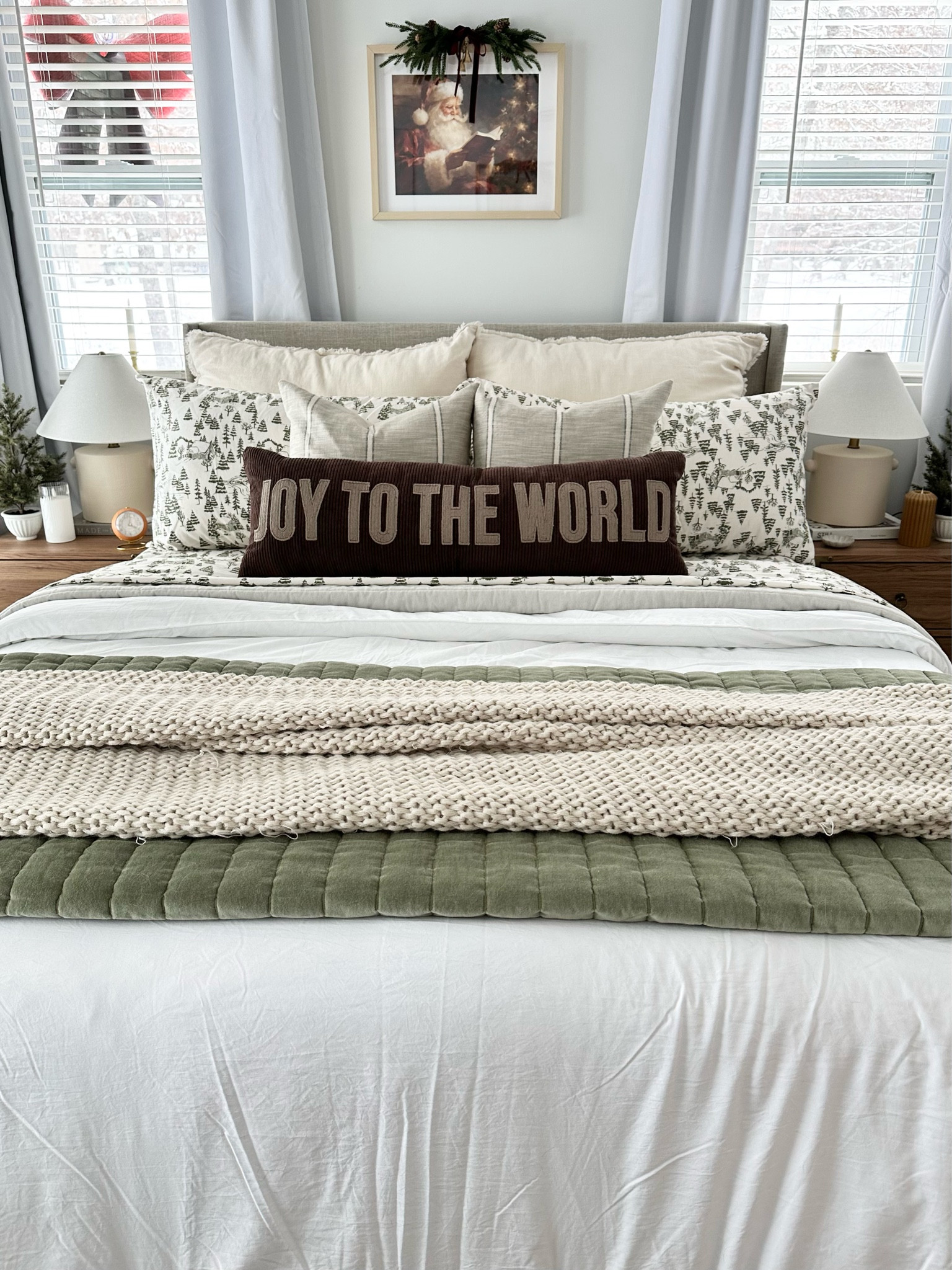 Cozy bedding, blankets, pillows and candles to add ambiance. Add in a little holiday magic with this Santa Claus print and mini Christmas trees! The bed lifts up for tons of extra storage! 

#LTKFindsUnder100 #LTKHome #LTKHoliday