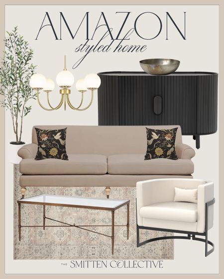 Amazon styled home includes fluted sideboard, decorative bowl, accent chair, coffee table, sofa, area rug, moody throw pillows, gold chandelier, and faux tree.

Home decor, moody decor, home accents, living room, styled home

#LTKhome #LTKstyletip #LTKfindsunder100