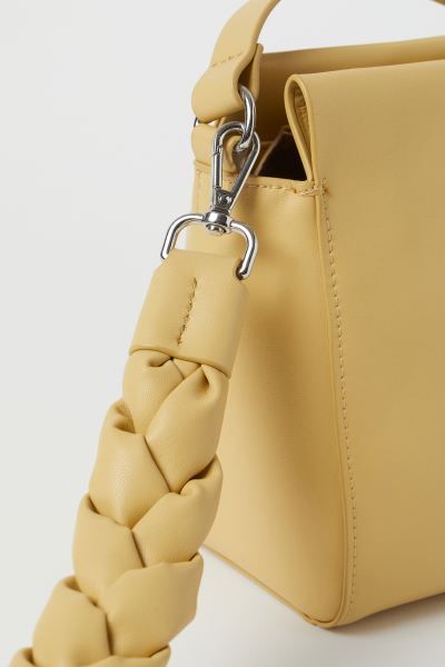 Small shoulder bag in faux leather. Narrow, adjustable shoulder strap, detachable, braided handle... | H&M (US)