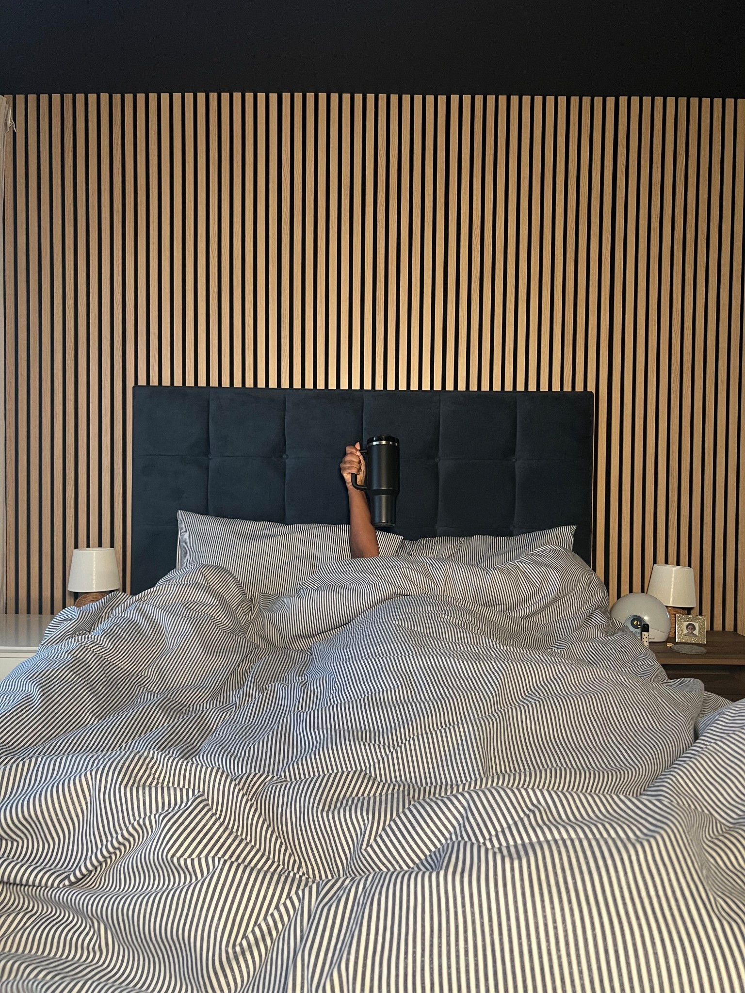 Sunday mornings done right 🥰

Primary bedroom, navy bedroom, dark blue bedroom, king size bed, ottoman bed, oak wood accents, mini lamps, 

#LTKwinter #LTKhome #LTKuk