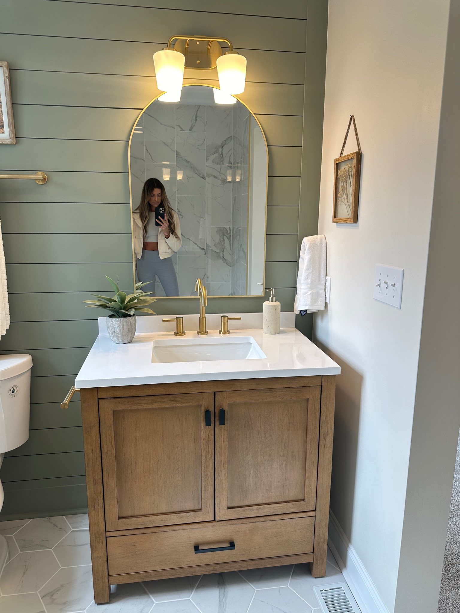 Bathroom remodel // home renovation// vanity // arch mirror // master bathroom // master suite 

#LTKfamily #LTKfindsunder50 #LTKSeasonal