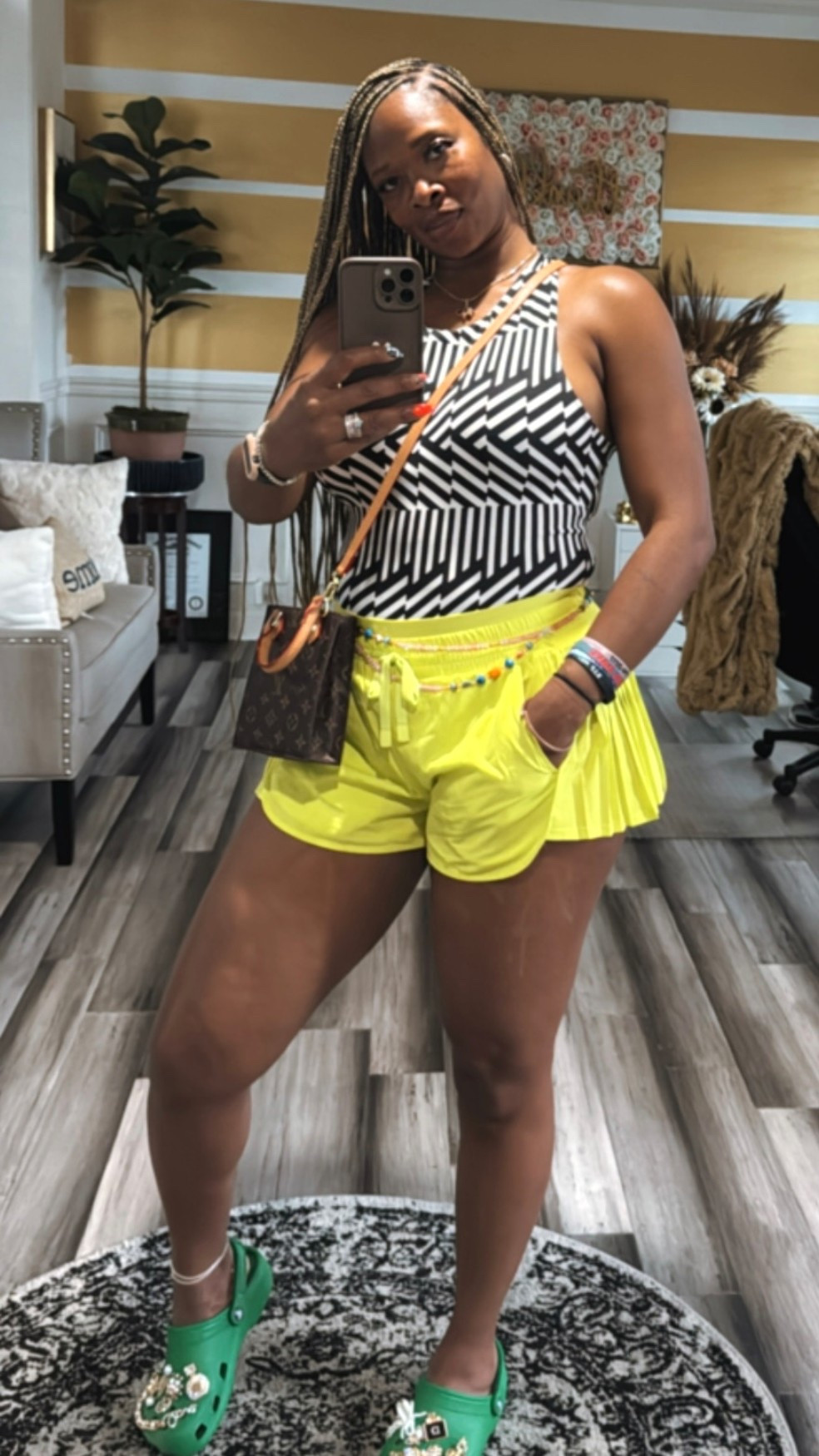 Lake day energy 💦 Rocking my lime green pleated girlie shorts from Target, a bold black & white striped one-piece from Express, and my embellished Crocs in sport mode, of course 😎💚 Linked it all for my lake babes!

#LTKSwim #LTKStyleTip #LTKSeasonal