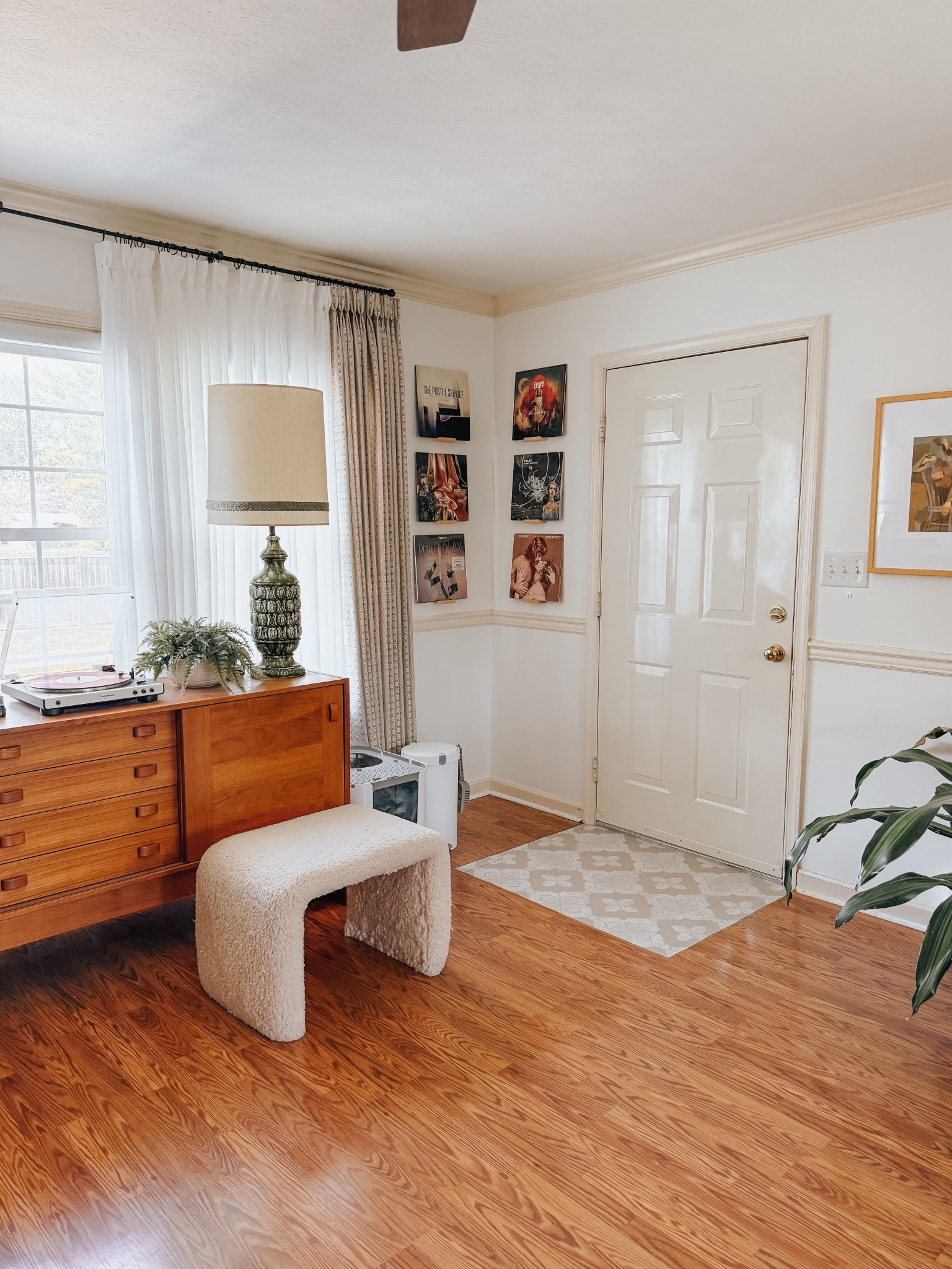 A corner of our sunroom that I don’t share often enough! I just installed these vinyl record shelves over the weekend and love how they turned out. Sources linked here ⭐️

#LTKHome
