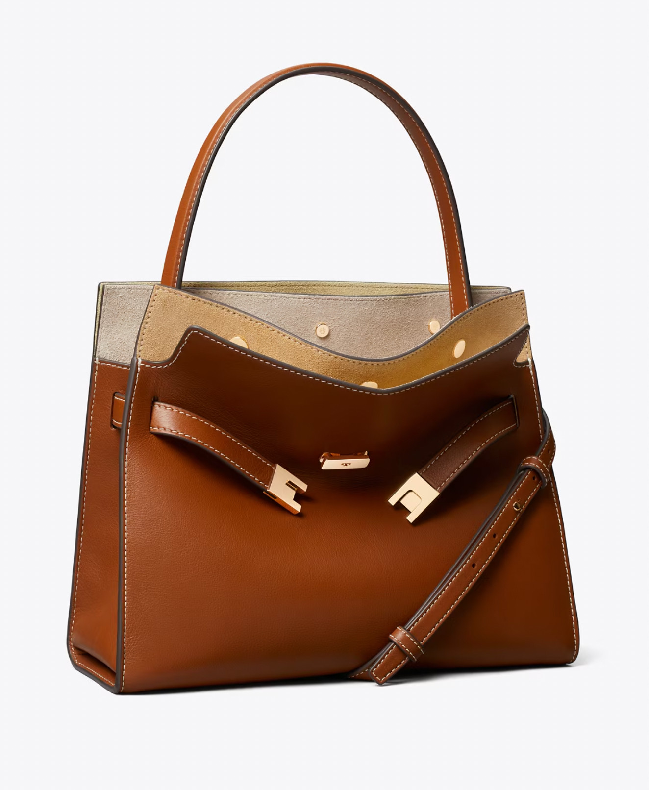 I'm obsessed - this is the SMALL but there is also a petite..I get a new Tory Burch bag every few years and she ends up being such a great staple piece. I normally do a black winter bag but I'm thinking of grabbing this beauty for Spring! I think she'll make a great everyday bag in this size and it's so elegant yet understated! Comes in a few colors! 

 #LTKValentine #LTKselfcare #LTKOver40