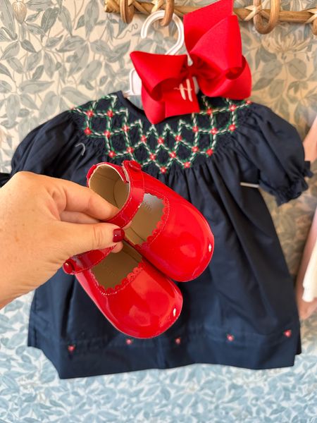 Hallie’s holiday dress and red patent shoes with monogram initial red bow. Little girls Christmas smocked dress Sale

#LTKbaby #LTKHoliday #LTKHolidaySale