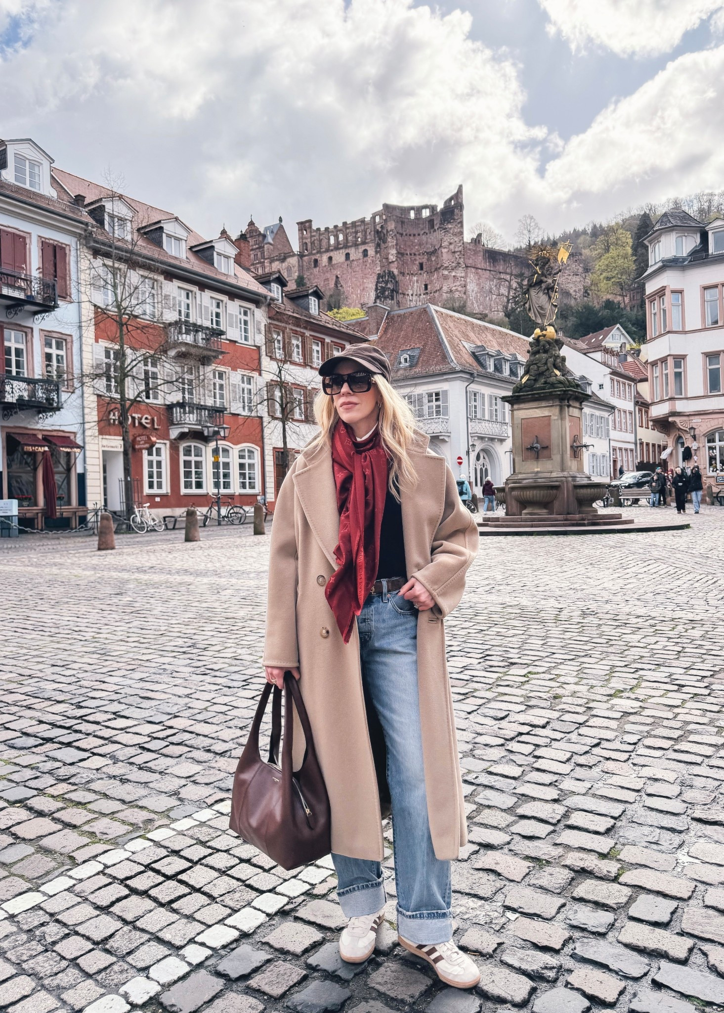 Spring travel look, European vacation, camel coat, @Zara baseball cap, red Louis Vuitton scarf, Levi’s baggy 90’s jeans, dark brown spring handbag 

#LTKSaleAlert #LTKTravel #LTKOver40