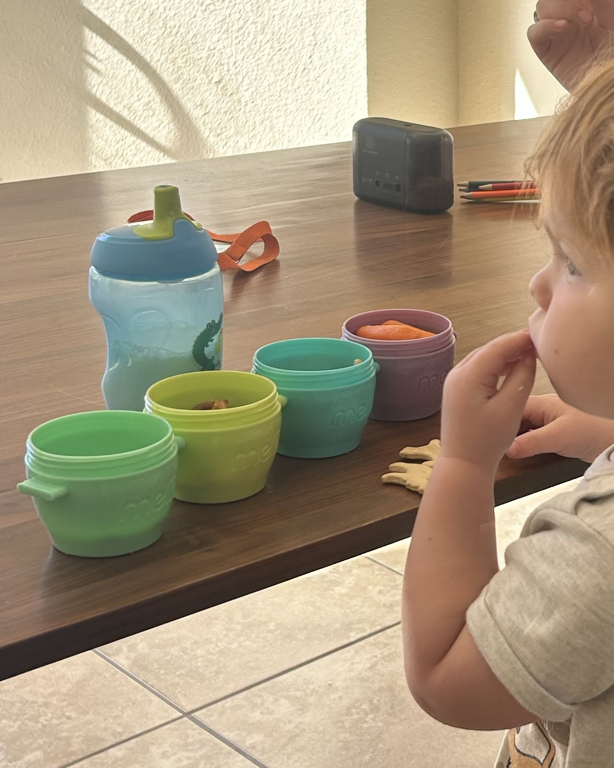 Best toddler snack containers!! Stackable and the perfect size! We take them to sports and church and he can have manageable sized snack options at once.