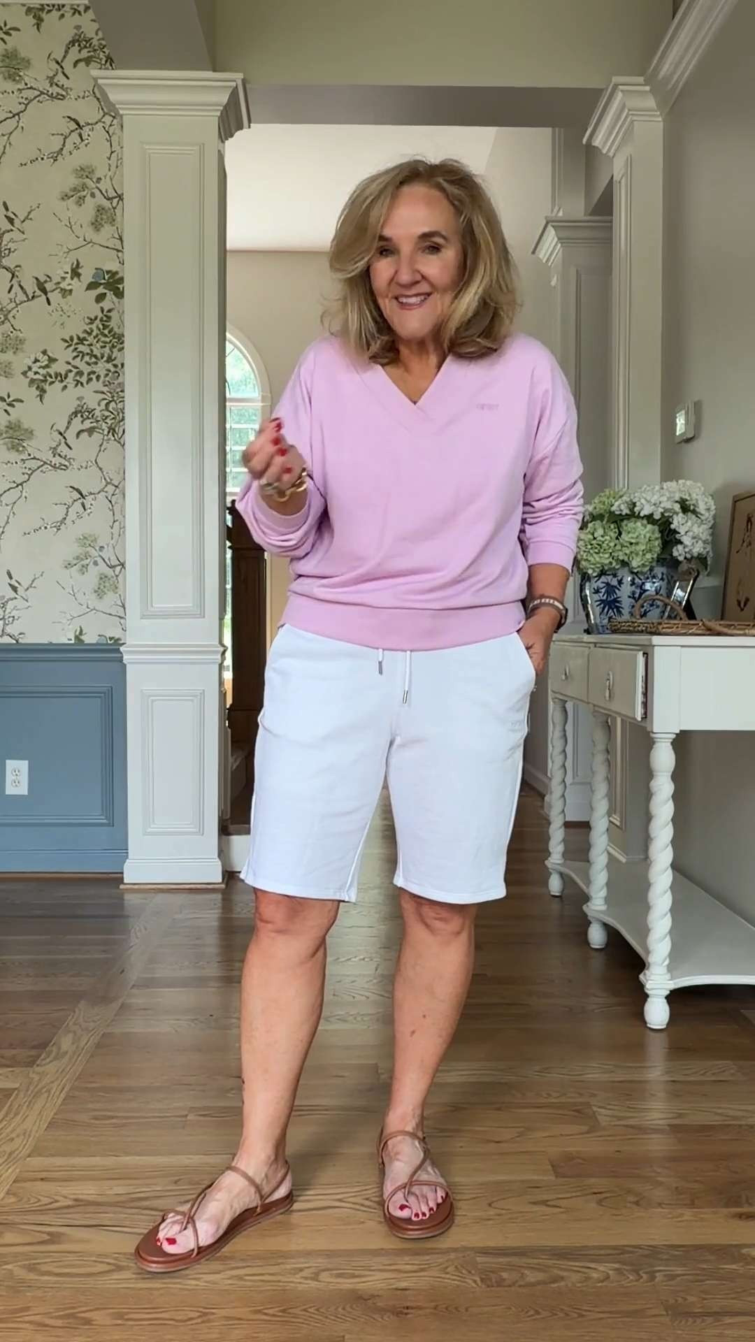 These white French terry shorts are a summer staple. Soft, comfy, and perfect with this relaxed pink v-neck sweatshirt. 🫶🏻 

 #LTKootd #LTKSeasonal #LTKOver40