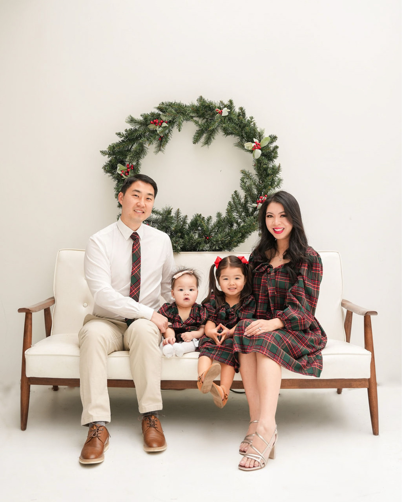Holiday matching family outfits for holiday photos, Holiday dress, midi dress green and red plaid print with bow and puff sleeves. Code 15TINABIT gets you 15% off at Ivy City Co

Runs large so size down! I’m wearing an XS when I’m usually a Size S

#LTKStyleTip #LTKFamily #LTKHoliday