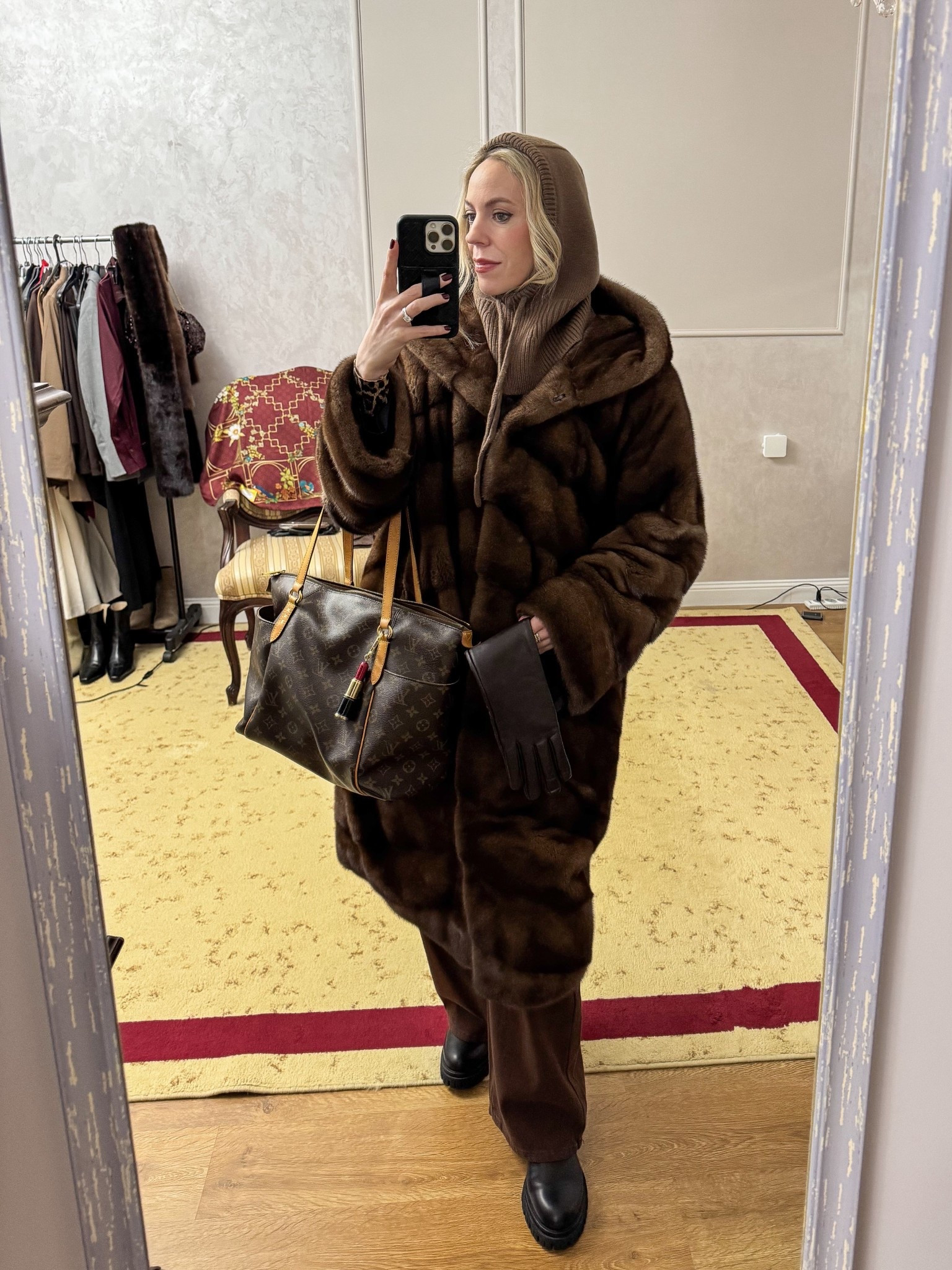 Brown fur coat, balaclava, winter workwear, brown jeans, black lug sole boots, Louis Vuitton tote bag, cold weather style

#LTKWorkwear #LTKootd #LTKOver40