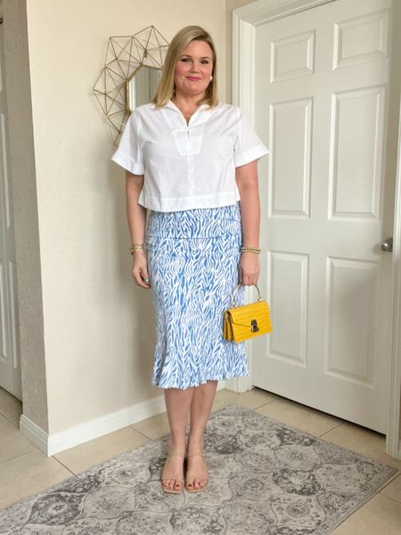 DVF x Target midi skirt fits TTS, in the large. Banana Republic Factory cropped blouse fits TTS, in the large. Sized down half a size in the sandals. Workwear. Spring. Summer  

#LTKmidsize #LTKxTarget #LTKover40