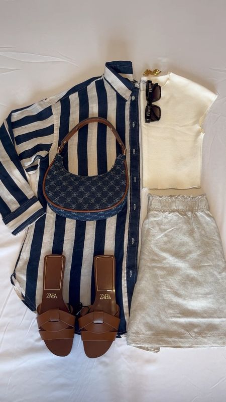 Styling a stripe shirt for Spring👌🏼
Tags: oversized linen dark navy stripes, denim jacquard bag, brown cross over sandals, shorts, crop top, fendi sunglasses, gold earrings. Fashion primavera inspo outfit ideas for casual brunch city break Dubai Barcelona H&M mango zara

#LTKshoecrush #LTKstyletip #LTKitbag