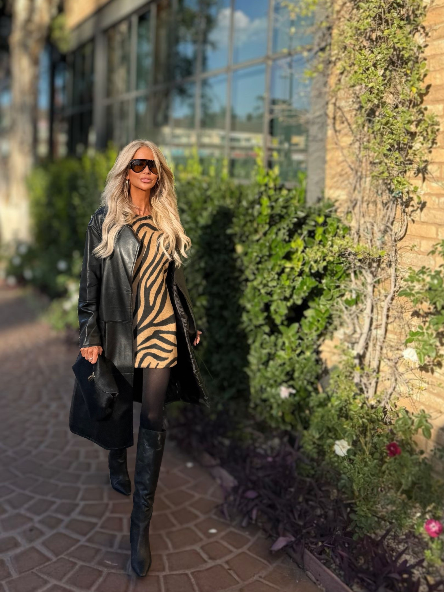 Zebra print steps up as the ultimate neutral for a January wardrobe refresh. 🦓

I’m wearing the SEROYA Florrie zebra mini dress—its bold pattern pops against the calf hair Toteme clutch and Reformation leather knee high boots.

#LTKgrwm #LTKOver40 #LTKdayinmylife