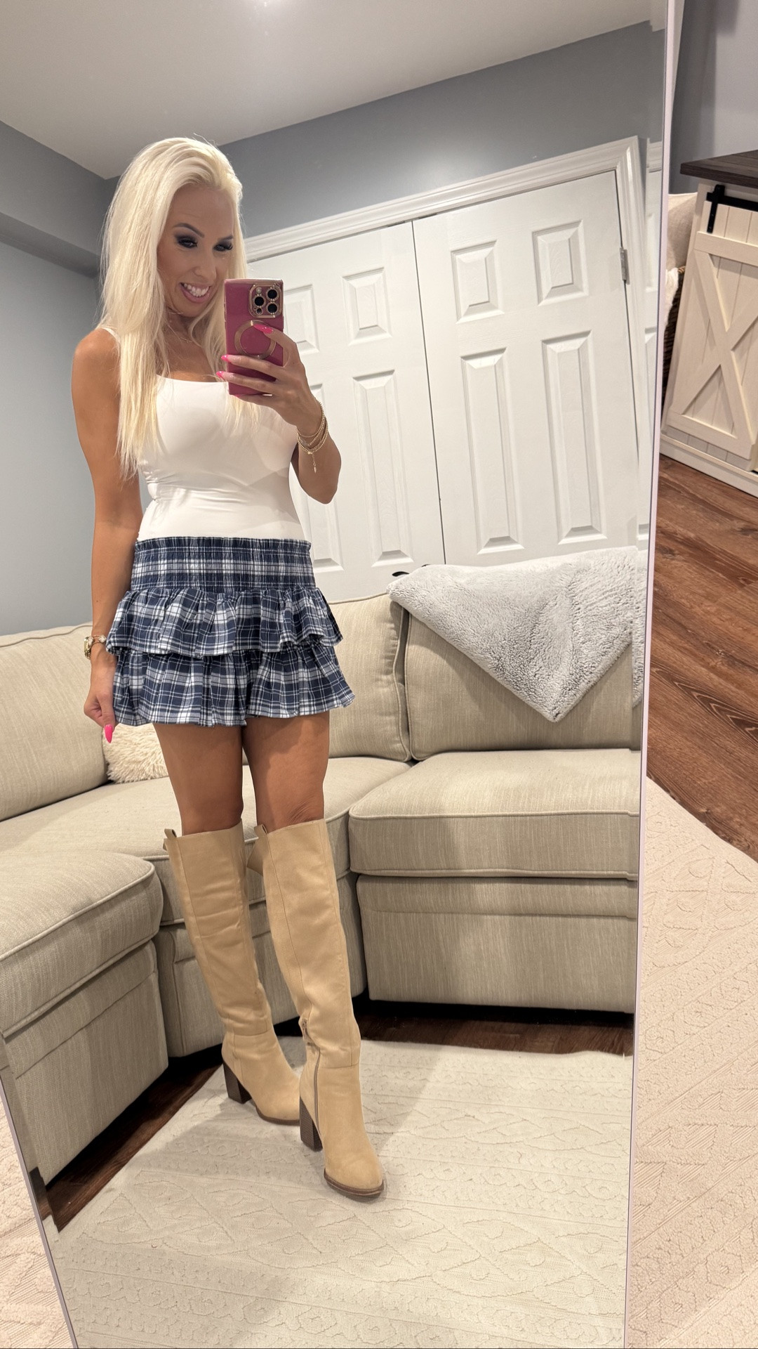The cutest affordable fall outfit! 🍂 This plaid ruffle skort is on sale for only $6, and the fitted white top is just $17! I would size down. I’m wearing a small. Paired them with neutral knee high boots for the perfect fall outfit, game day look, or casual weekend style.

#LTKootd #LTKstorytime #LTKSeasonal
