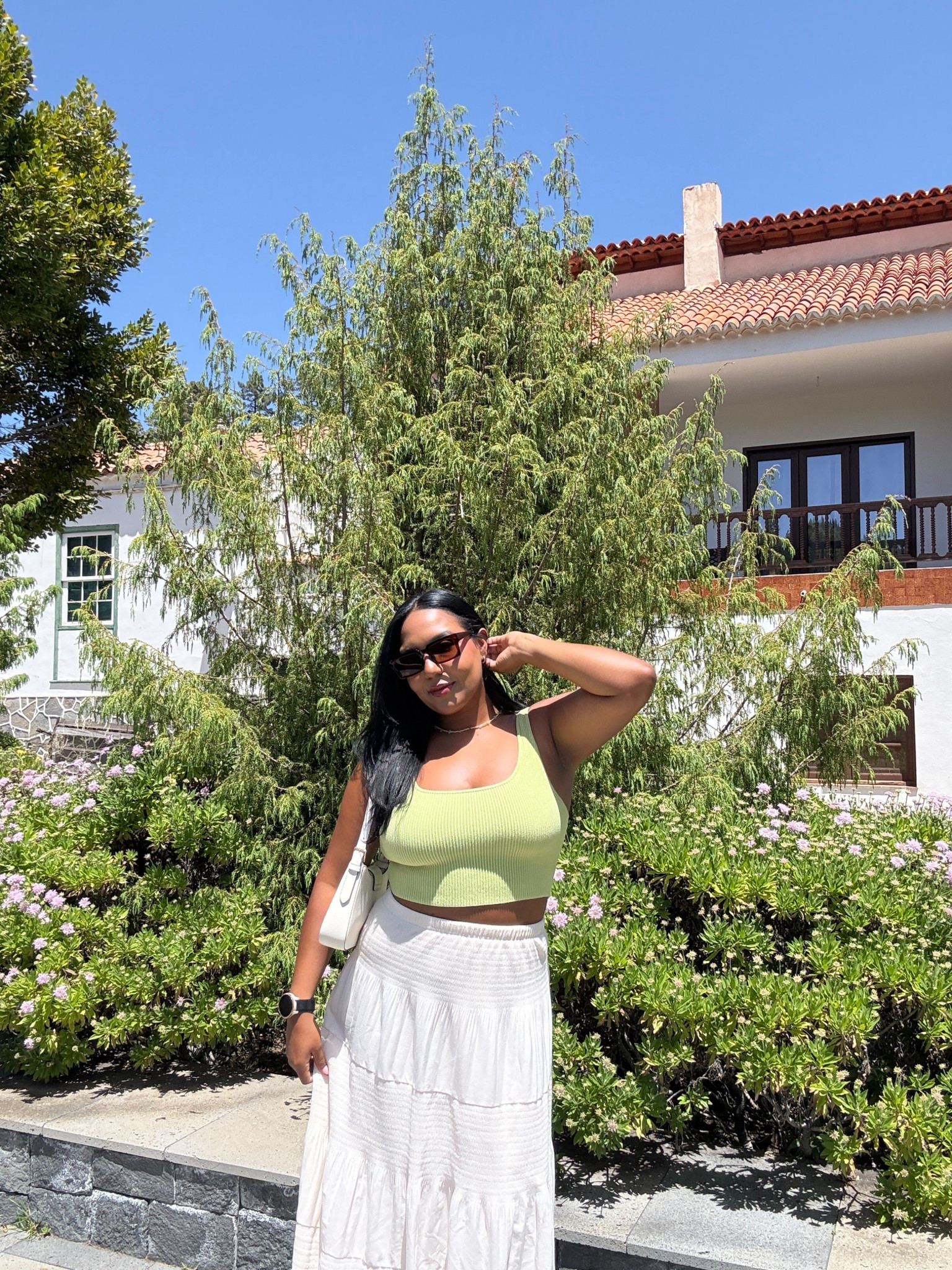 Summer outfit inspo for your next vacation or weekend outing! This ribbed knit crop top in a fresh lime green pairs perfectly with a flowy tiered white maxi skirt for an effortless, coastal chic vibe. This look is all about quiet luxury, resort wear elegance, and midsize-friendly fashion, embracing a flattering high-waisted skirt and a minimalist color palette. Style it with sleek sunglasses, a mini shoulder bag, and natural glam makeup to complete the elevated casual feel.

#LTKItBag #LTKMidsize #LTKSeasonal