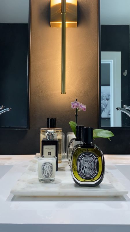 How would I describe this scent? Woody, Earthy, Spicy, simply intoxicating 🖤✨

Diptyque Tempo, my summer scent.

Do I love Diptyque because of the their scents? yes. Do I like Diptyque because of their packaging? Double yes 😍

#homedecor #bathroomdesign #perfume #perfumecollection #diptyque #diptyqueparis #summer #bocaraton #bocaratonflorida


#LTKSeasonal #LTKbeauty #LTKstyletip