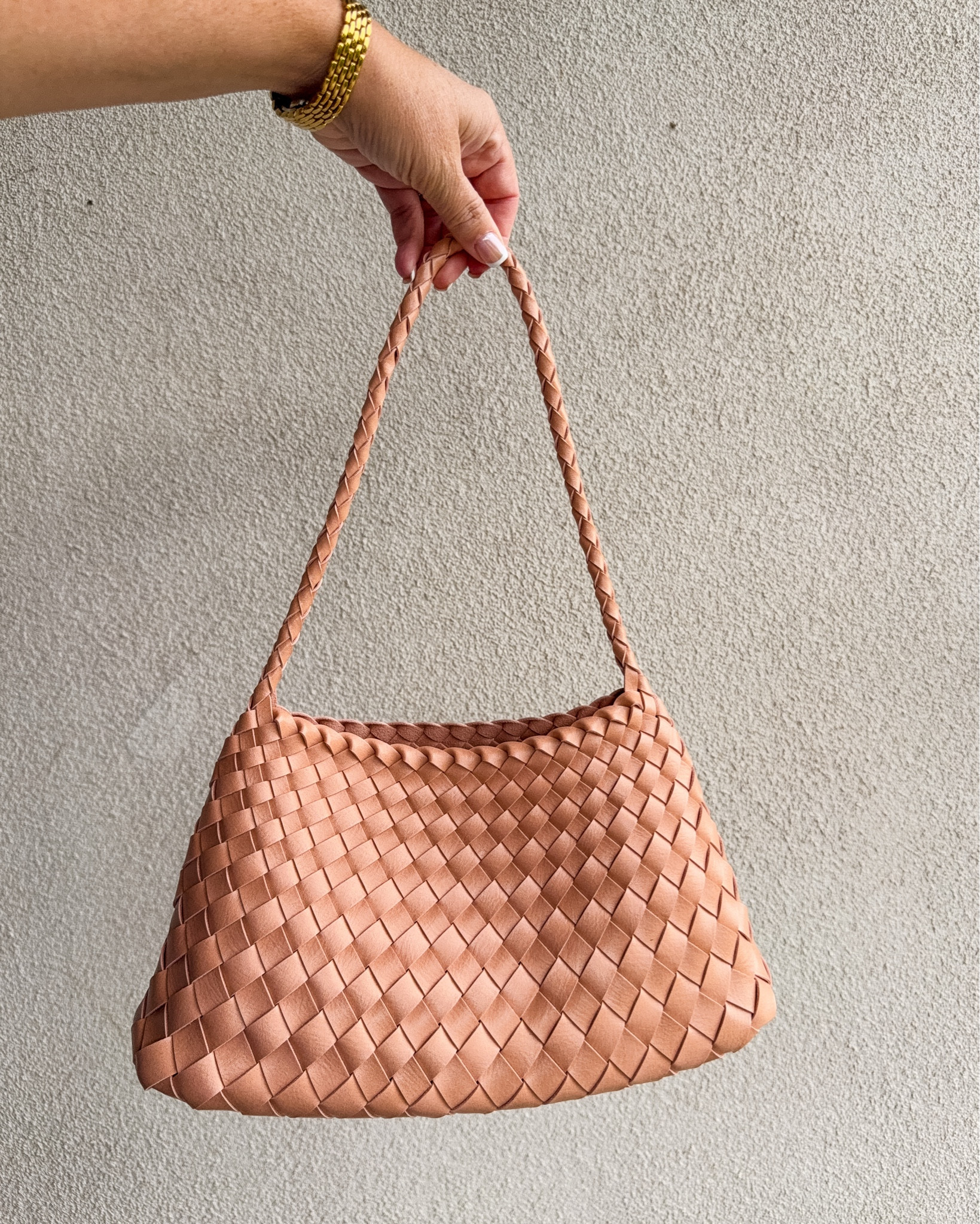 This Calla Woven Shoulder Bag in neutral from Anthro is a versatile and timeless and comes in a TON of colors though I'm loving this new shade for summer!

#LTKSeasonal #LTKWorkwear #LTKTravel