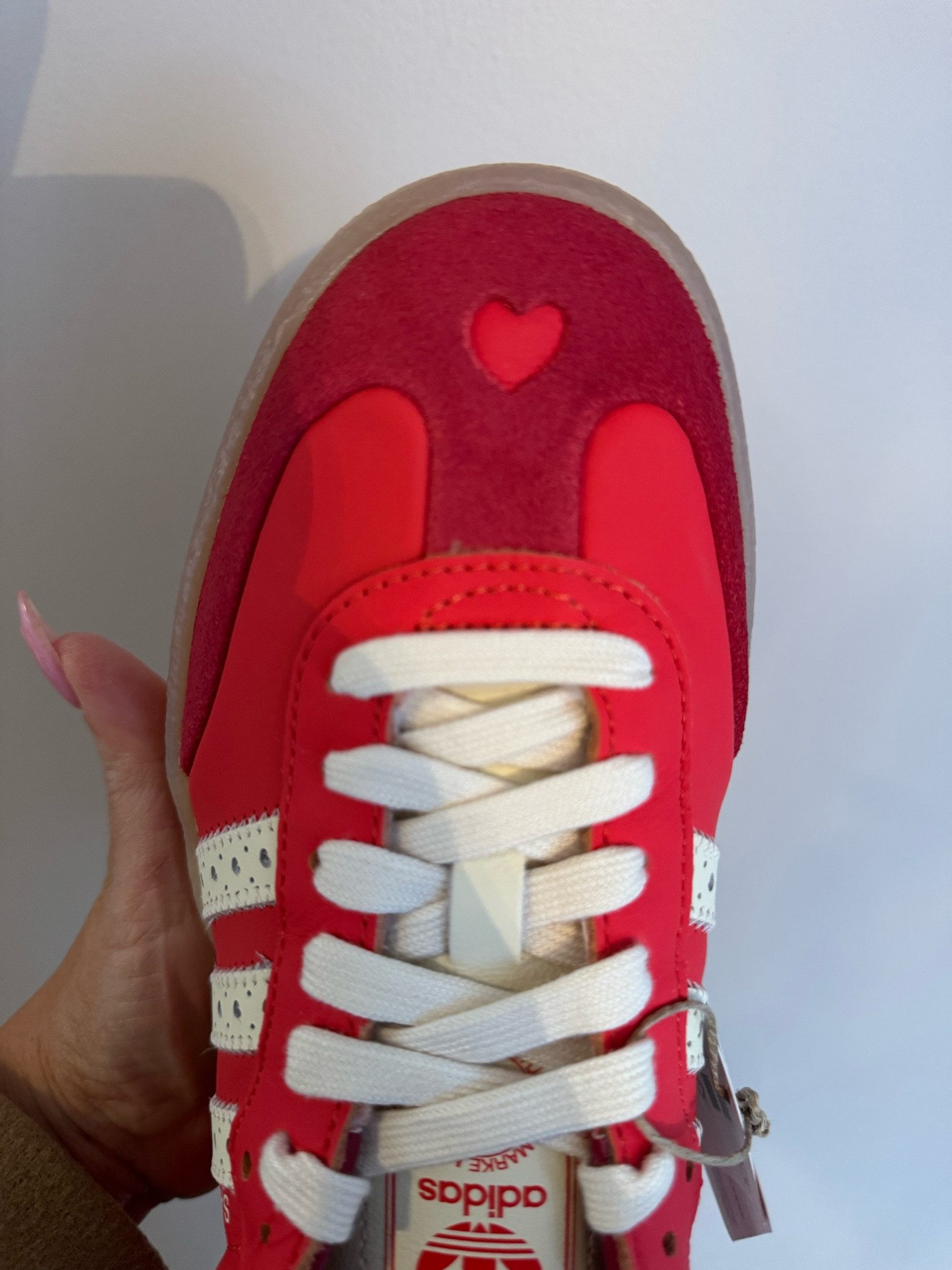 Valentine’s Day Sambas! 
The red heart details ❤️❤️❤️❤️ obsessed! 

Most comfortable casual sneakers. Be sure to size down atleast 1/2
size! 

#LTKTravel #LTKShoeCrush #LTKFitness