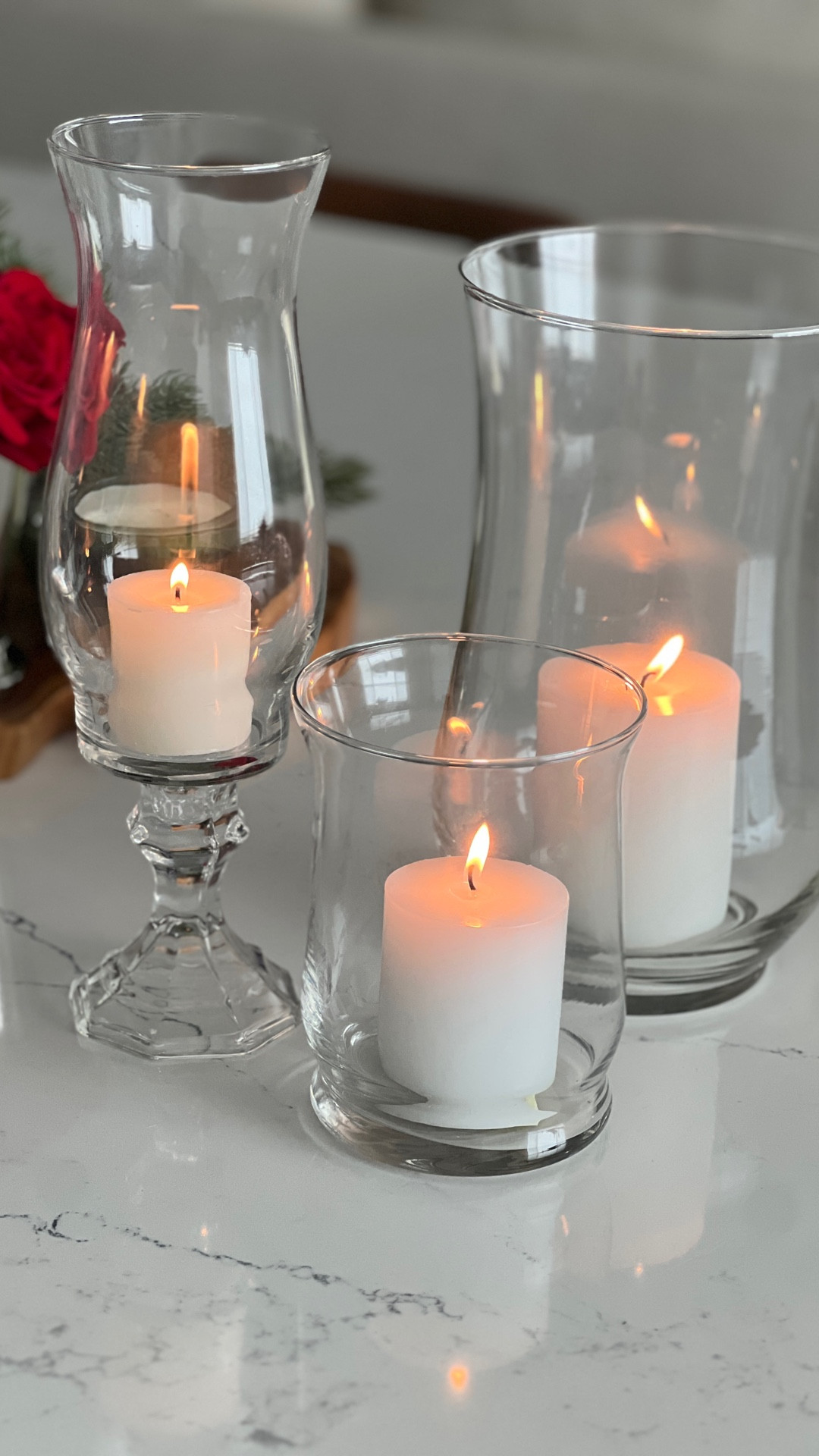 Classic Christmas red Tartsn plaid Tablescape! Hurricanes, DIY, candles, glass candlesticks 

#LTKHoliday #LTKSeasonal #LTKHome