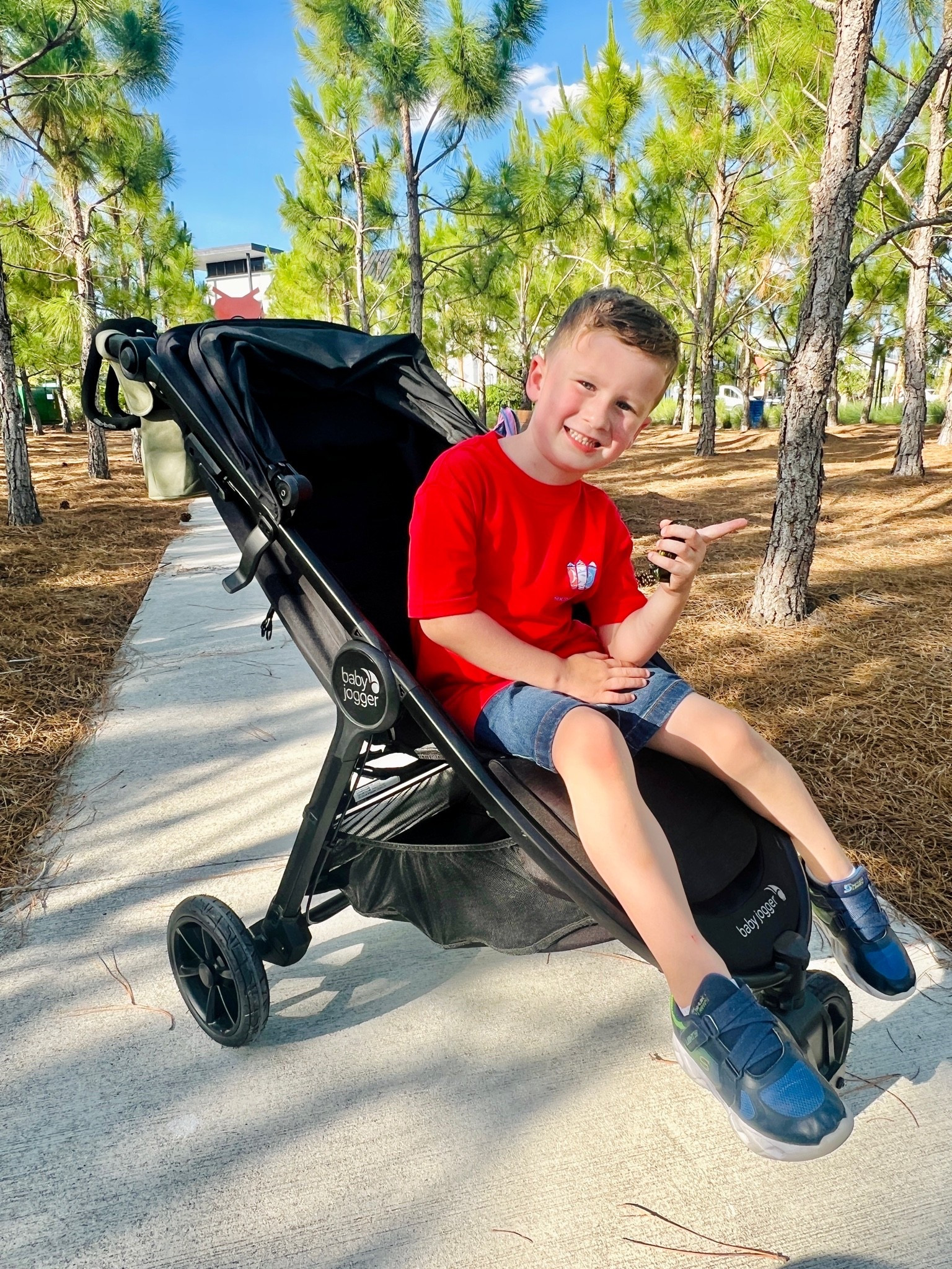 Best Stroller Disney World big kid approved. This stroller glides like a dream and it's perfect for tall big kids. Lots of storage space for Disney world bags and easy to collapse for Disney buses! Our favorite way to get around Walt Disney world with a 5 year old boy.

#LTKSeasonal #LTKTravel #LTKKids