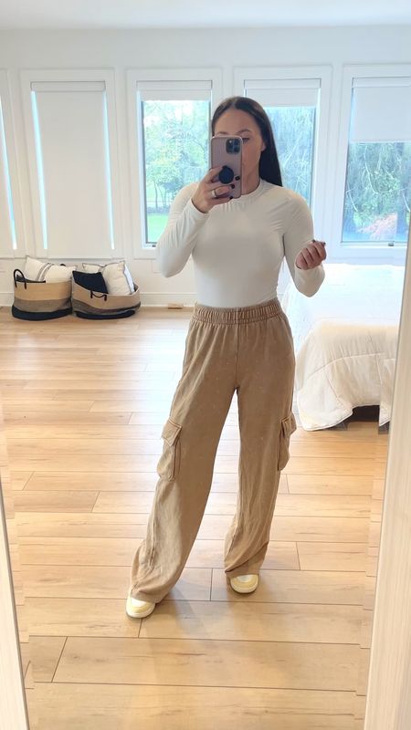 Cargo sweatpants FTW 🙌🏼 I’m wearing my normal size small so they fit true to size, but they are a bit long for me at 5’4”. 

When I put them on with platform sneakers they barely graze the ground so that works! If you’re shorter than 5’4” you will likely have trouble with the length. 

They’re great for cute casual fall outfits but also perfect for lounging! 

I linked the bodysuit and sneakers as well. Use code MEMBER20 for 20% off the Nike dunks! 

#targetfashion #targetstyle #targetfinds

#LTKfindsunder50 #LTKstyletip #LTKVideo
