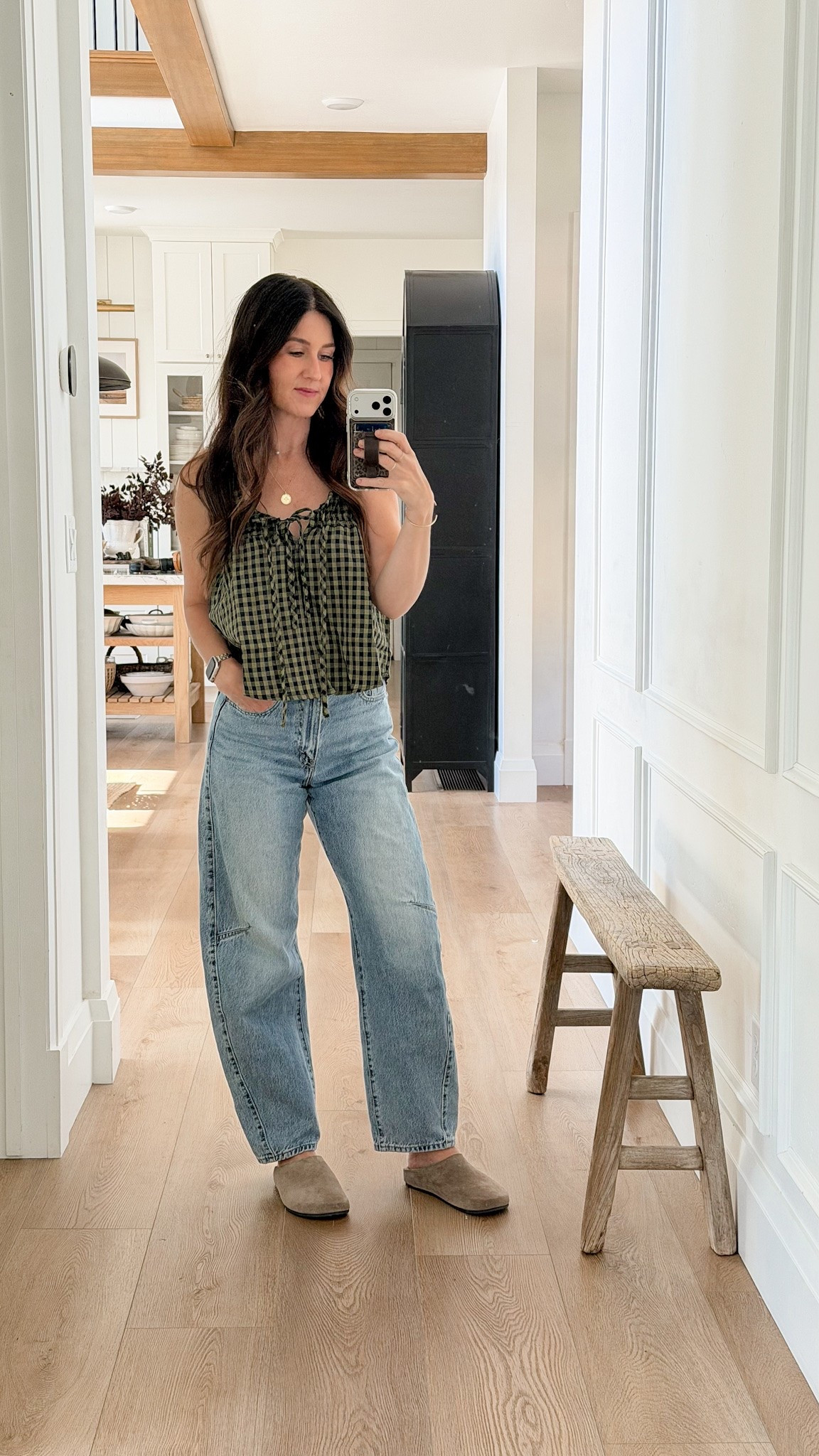 Still obsessing over these Amazon tops! I have it in the blue gingham and the green and navy gingham. So so good for transitioning from summer to fall and it’s super affordable too! 

Also loving these new suede clogs, the shape is so good and the color is perfect. I’ll be wearing these all fall through winter.
 Sizing: wearing a small on the top 25 regular in the denim and I did size up a half size in the clog. 

Amazon fashion, jeans, addendum, Levi’s, Jeffrey, Campbell, suede, clog, slide, fall, fashion, mom, fashion, OOTD, necklace, bracelet ￼

#LTKootd #LTKmomlife #LTKSeasonal