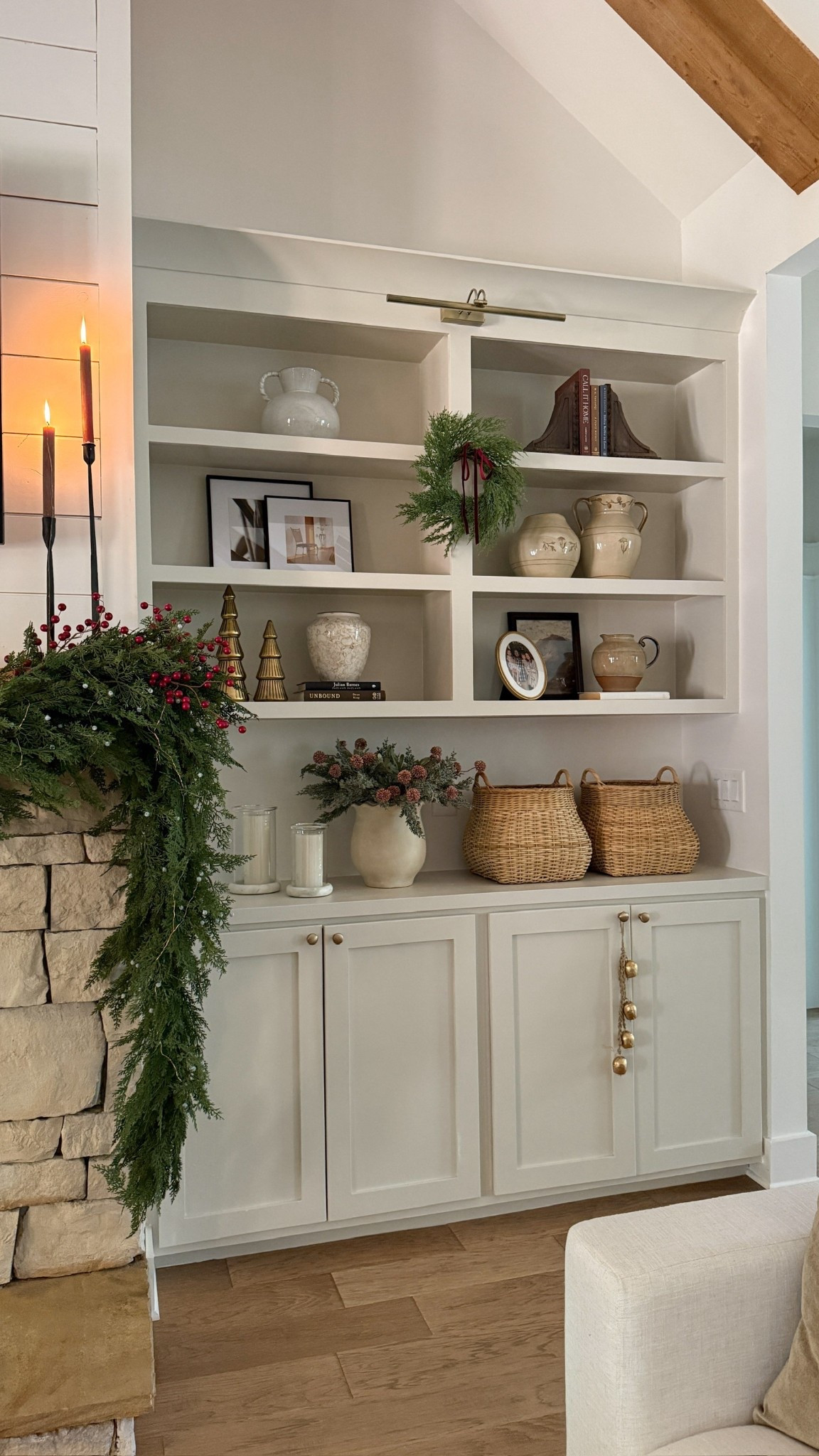 Loving how Christmas in our living room is coming together! I love mixing greenery with texture and pops of red for a lived-in, classic Christmas look!

#LTKHoliday #LTKHome #LTKFindsUnder50