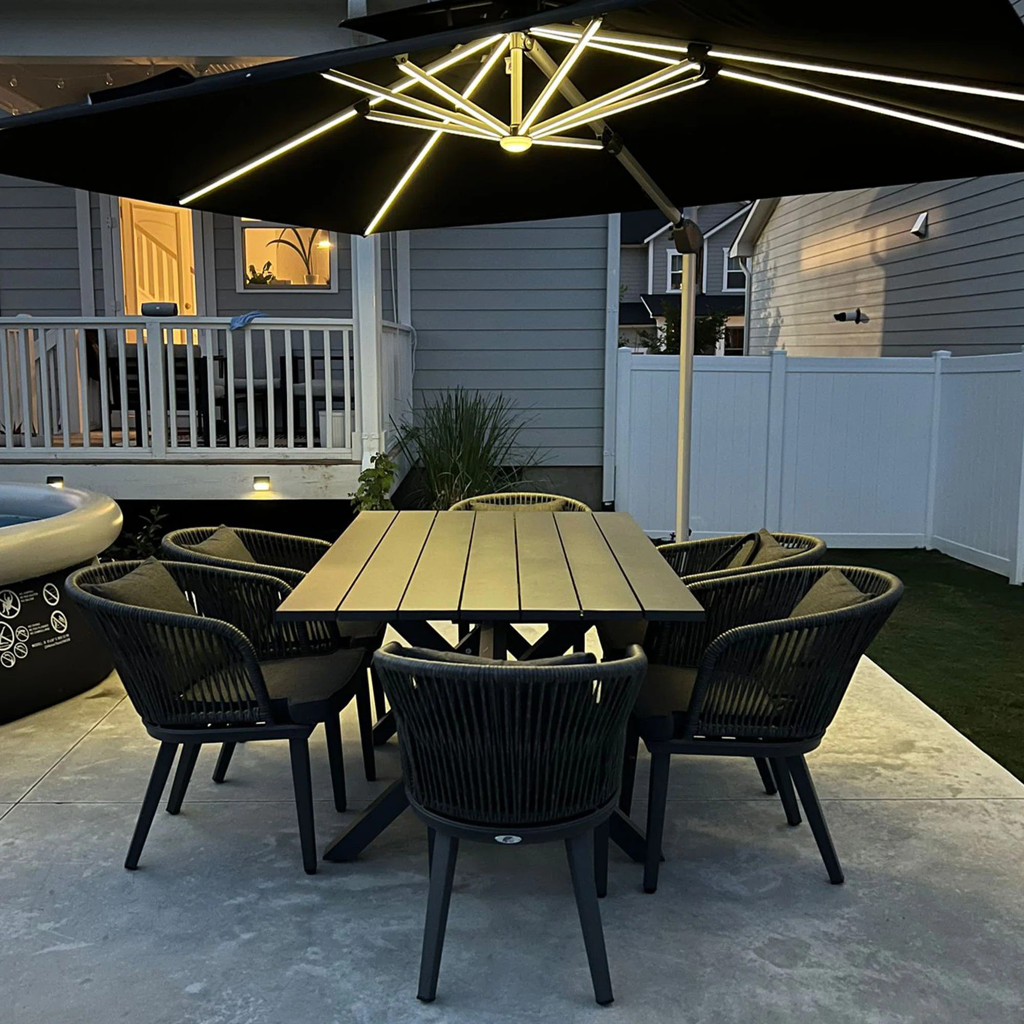 Leylashka 6 - Person Rectangular  Outdoor Dining Set with Cushions and Pillows | Wayfair North America